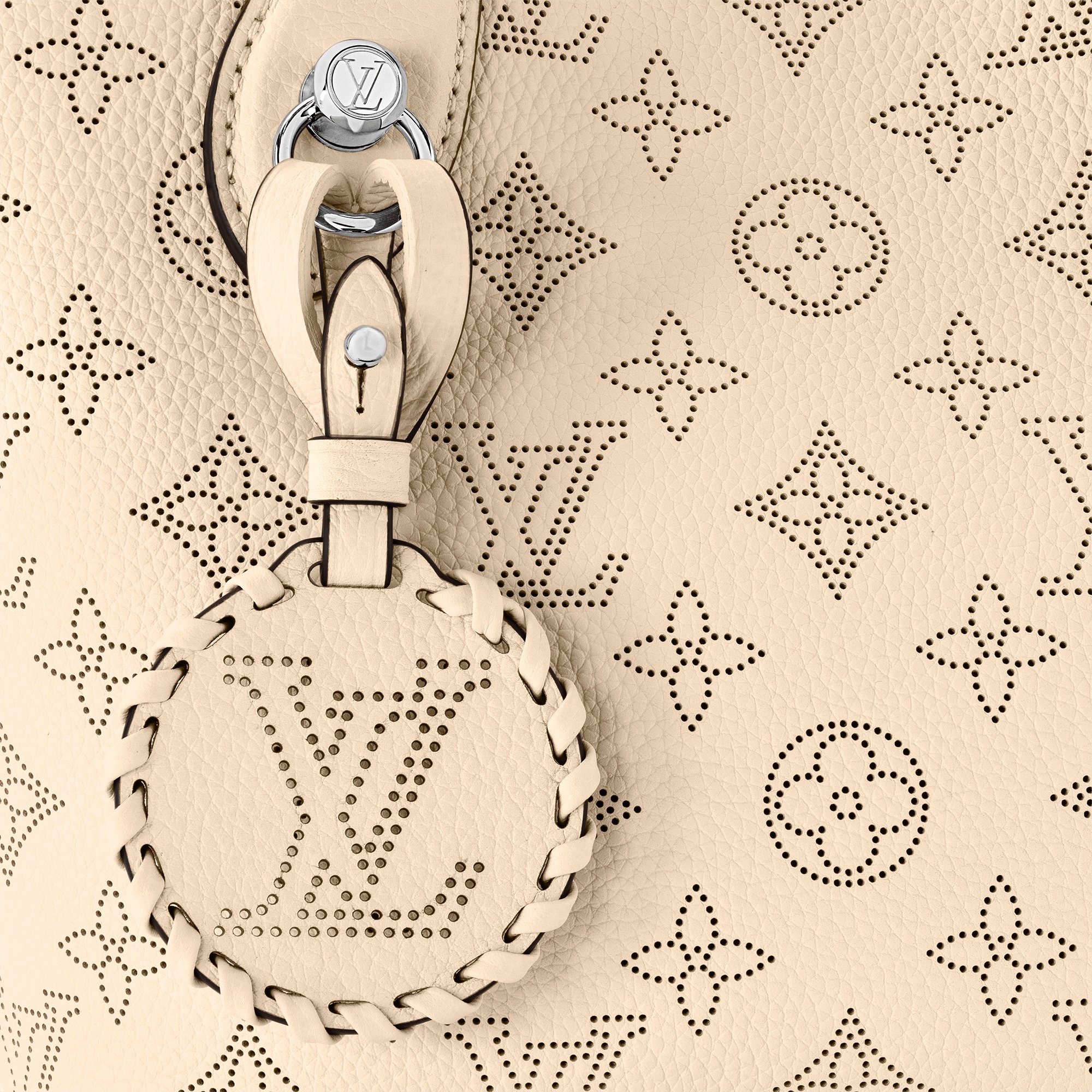 louis-vuitton-blossom-pm-mahina-leather-handbags-M21909_PM1_Detail_20view-1.jpg