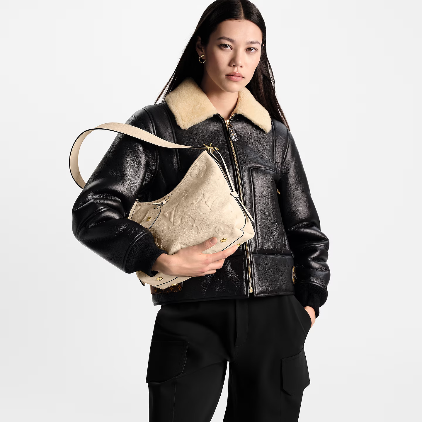 louis-vuitton-carryall-pm-monogram-empreinte-leather-handbags-M46293_PM1_Worn-view.jpg
