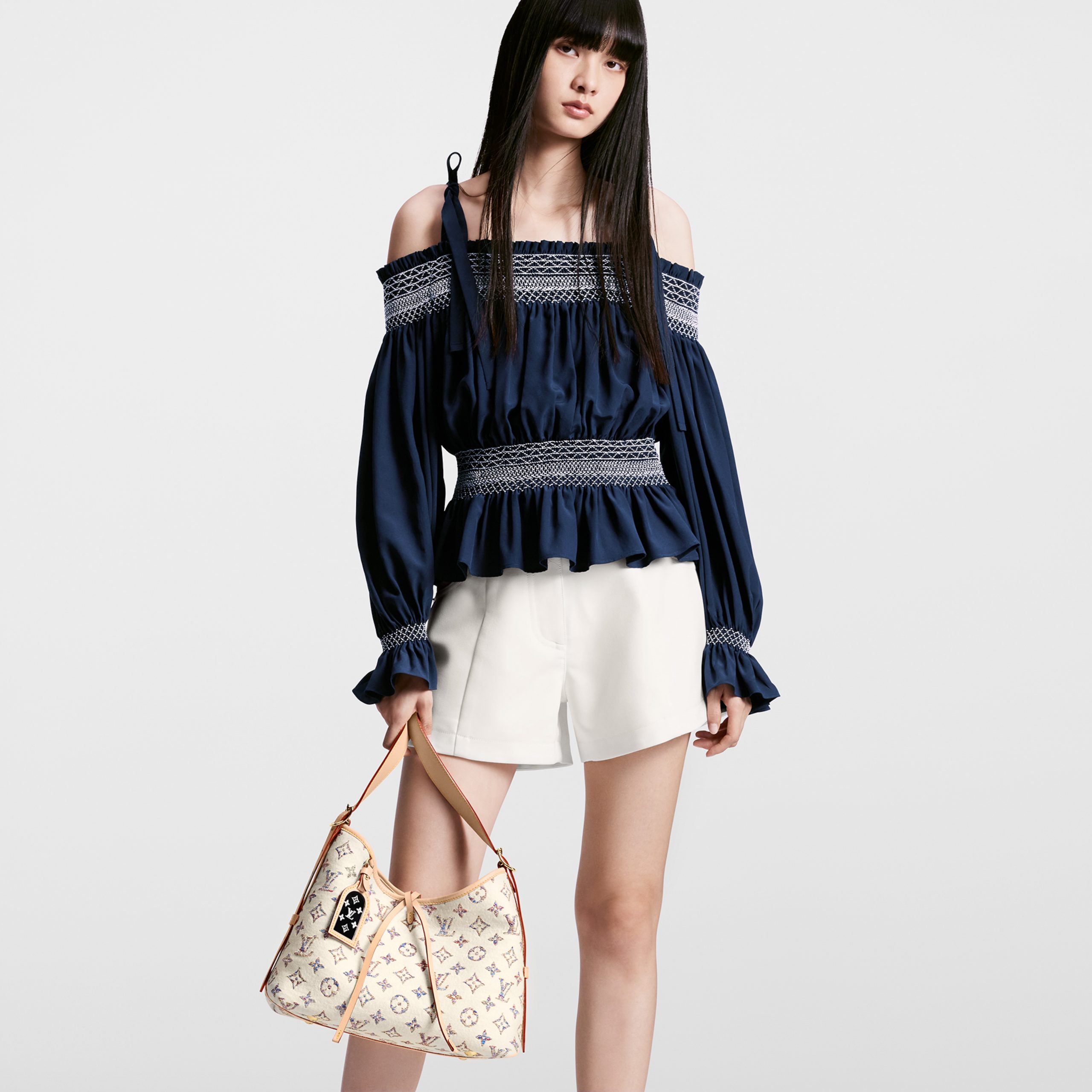 louis-vuitton-carryall-pm-other-monogram-canvas-handbags-M24707_PM1_Cropped_20worn_20view-scaled-2.jpg