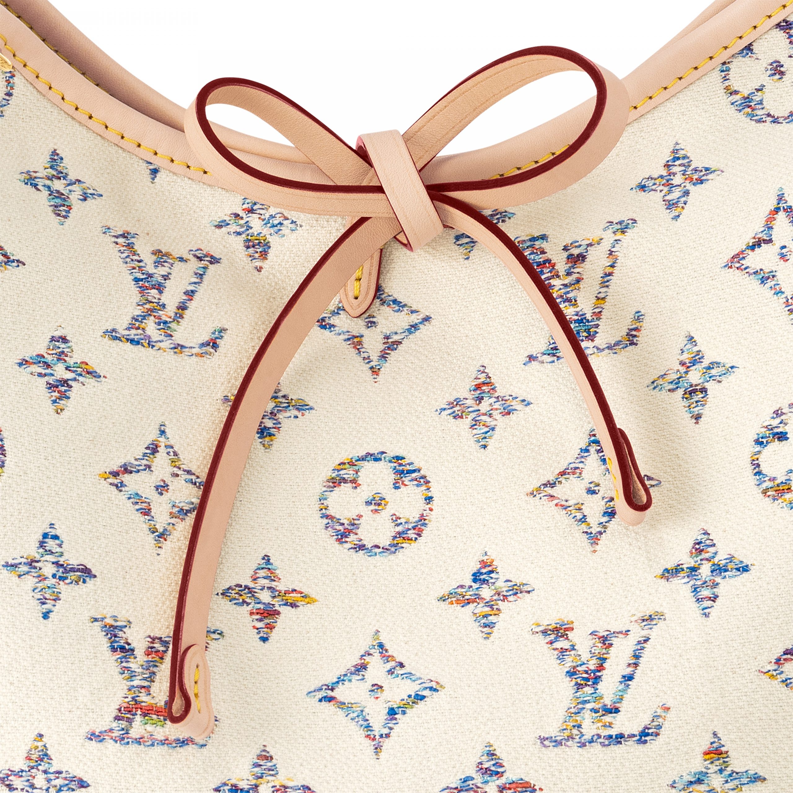 louis-vuitton-carryall-pm-other-monogram-canvas-handbags-M24707_PM1_Detail_20view-scaled-2.jpg