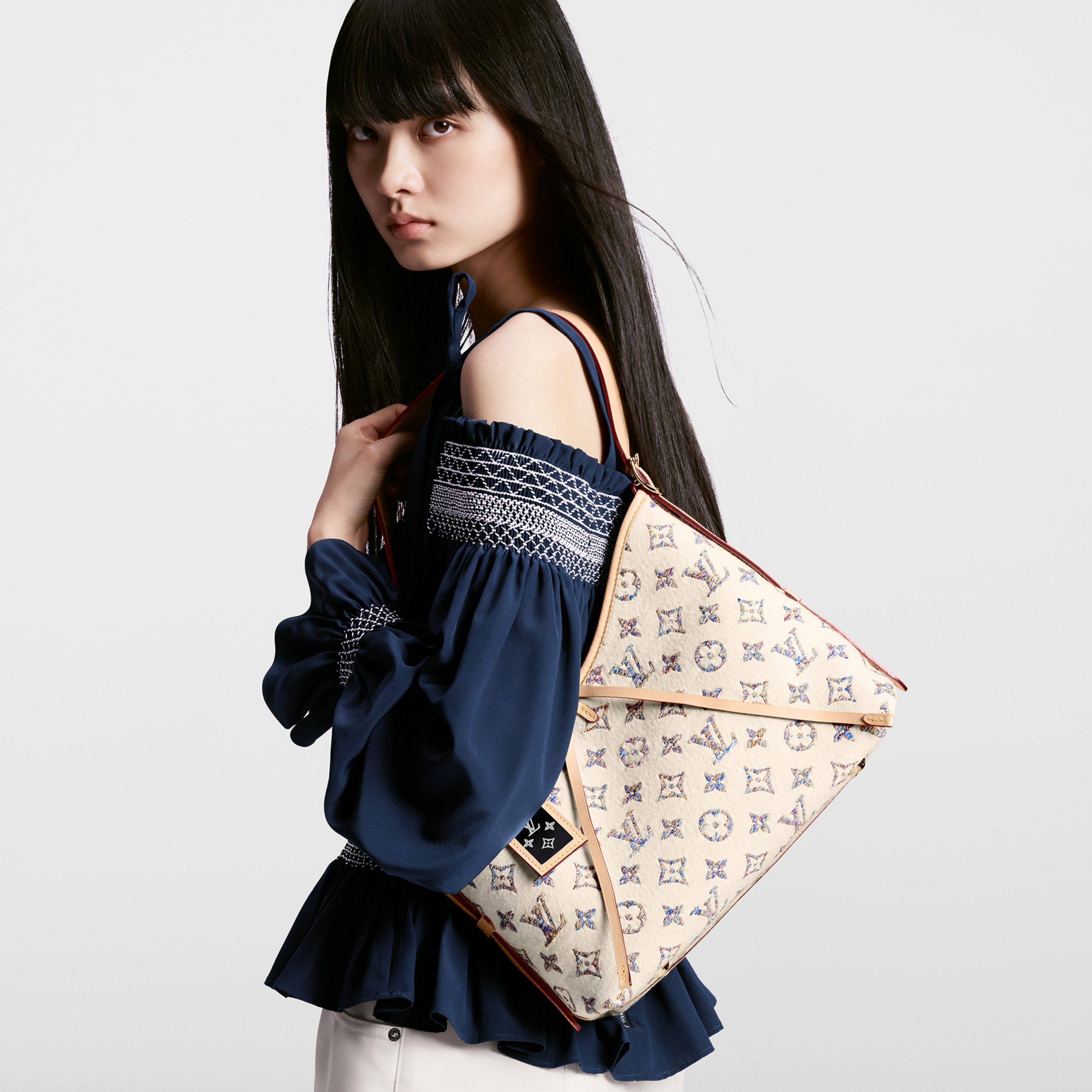 louis-vuitton-carryall-pm-other-monogram-canvas-handbags-M24707_PM1_Worn_20view-scaled-2.jpg