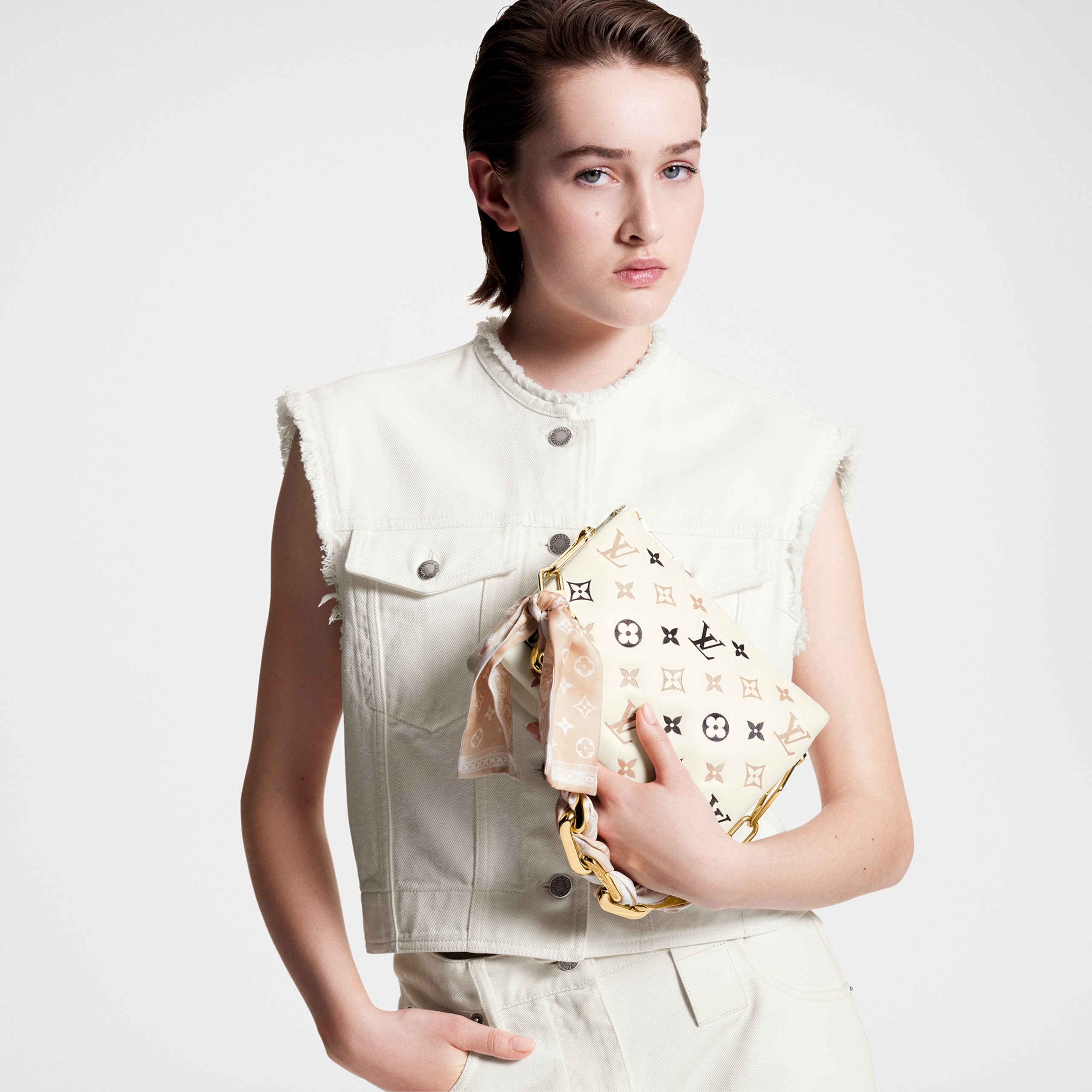 louis-vuitton-coussin-bb-bag-h32-handbags-M22954_PM1_Cropped_20worn_20view-scaled-2.jpg