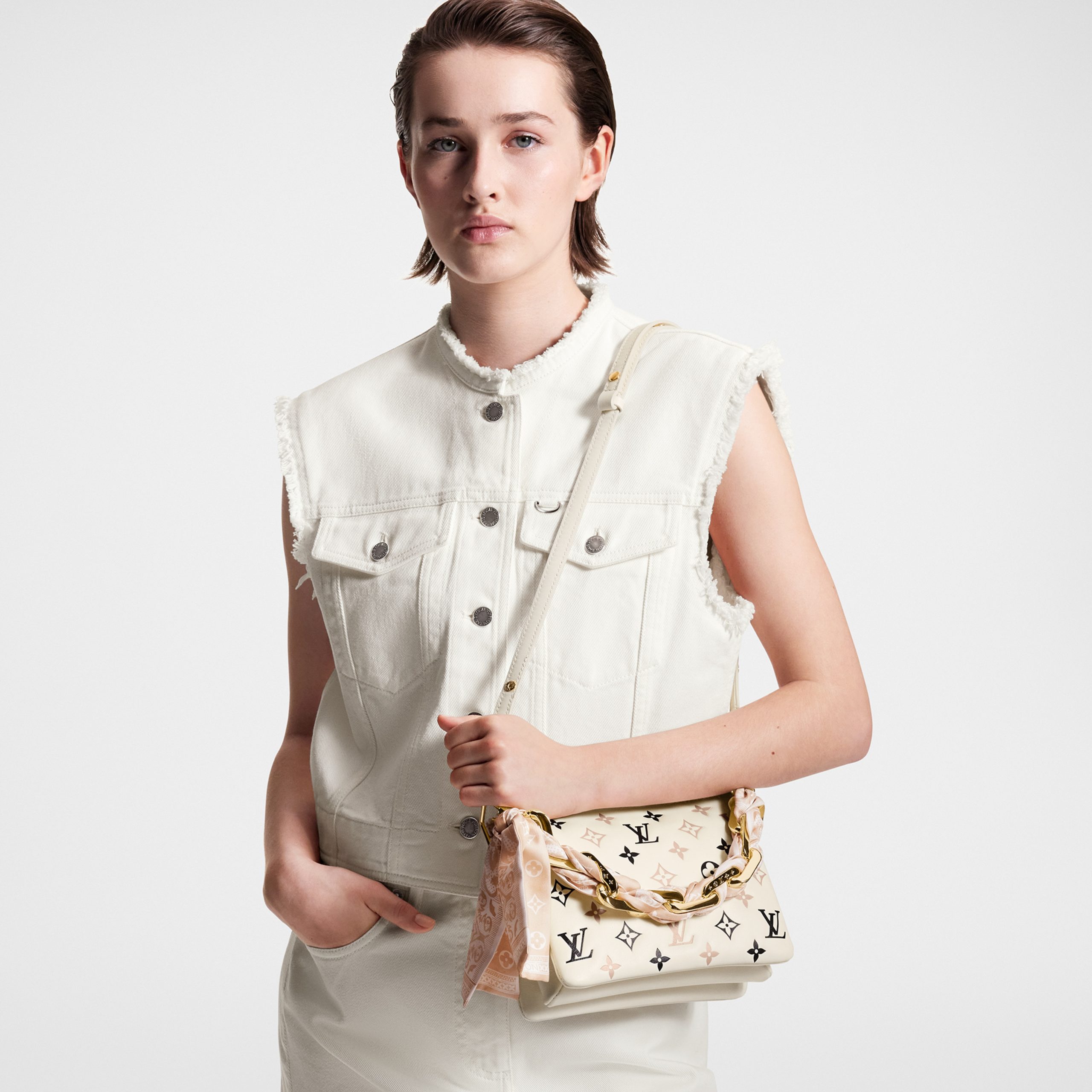 louis-vuitton-coussin-bb-bag-h32-handbags-M22954_PM1_Worn_20view-scaled-2.jpg