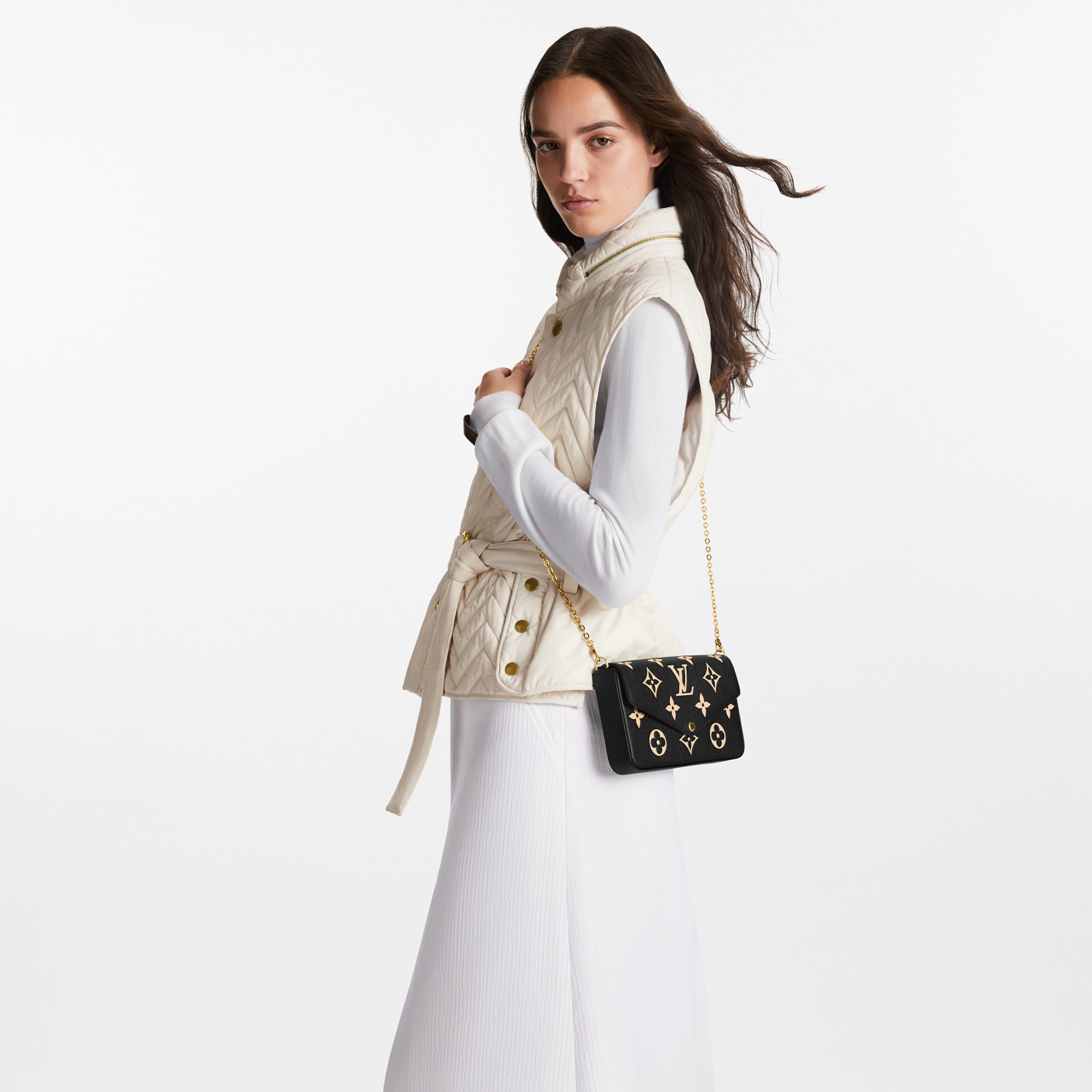louis-vuitton-f_C3_A9licie-pochette-monogram-empreinte-leather-small-leather-goods-M82479_PM1_Worn_20view-scaled-2.jpg