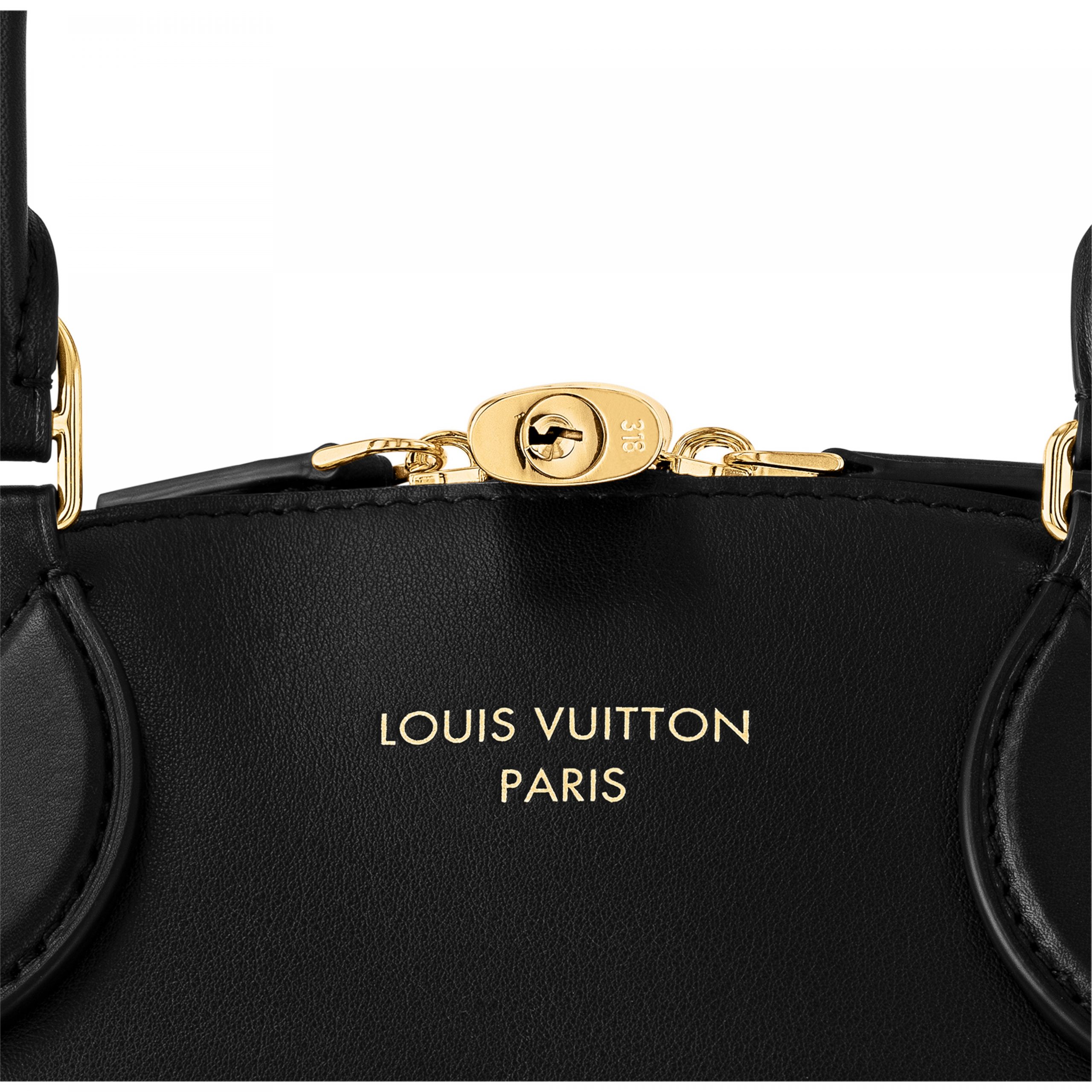 louis-vuitton-lock-it-mm-high-end-leathers-handbags-M22914_PM1_Detail_20view-scaled-2.jpg