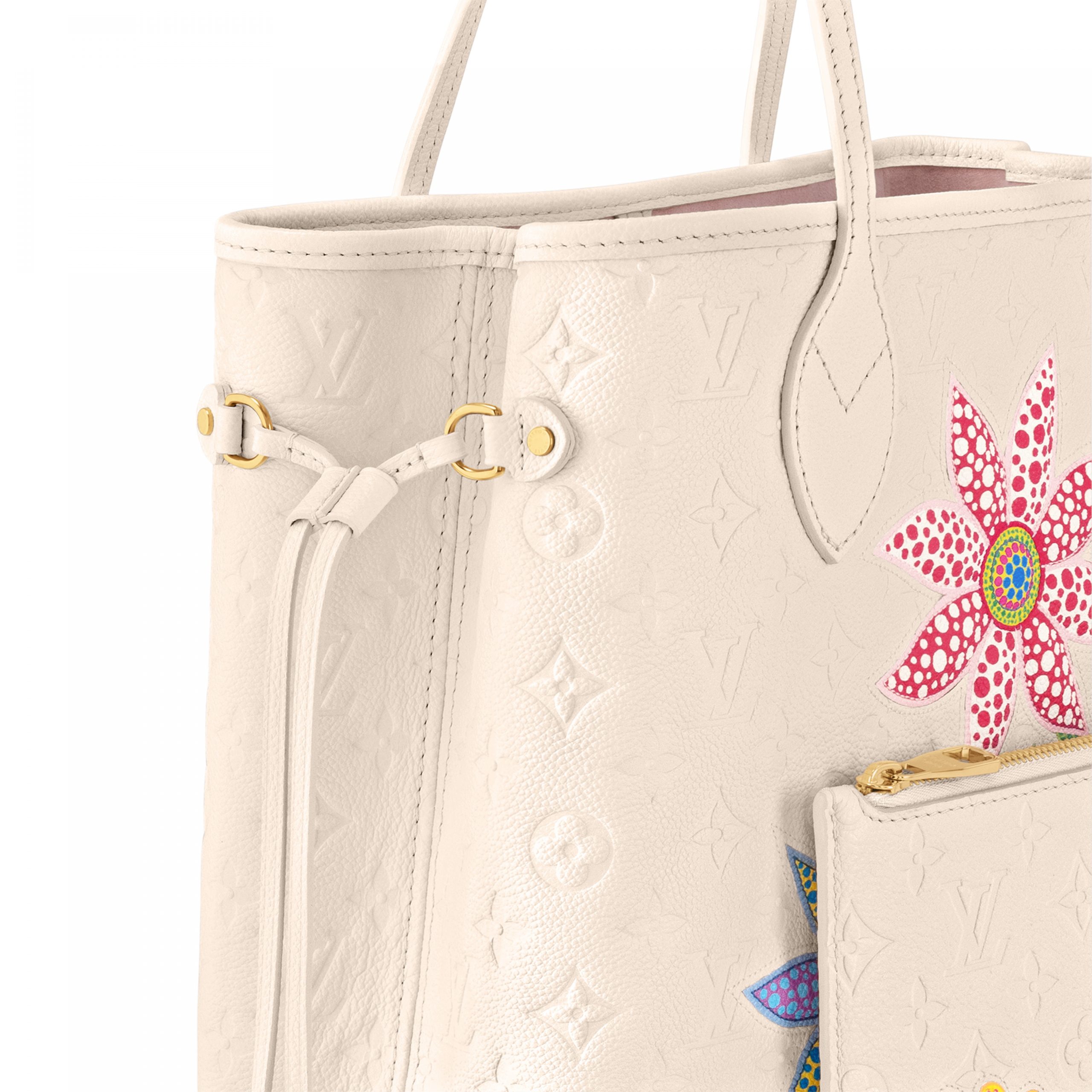 louis-vuitton-lv-x-yk-neverfull-mm-monogram-empreinte-leather-handbags-M21733_PM1_Closeup_20view-scaled-1.jpg