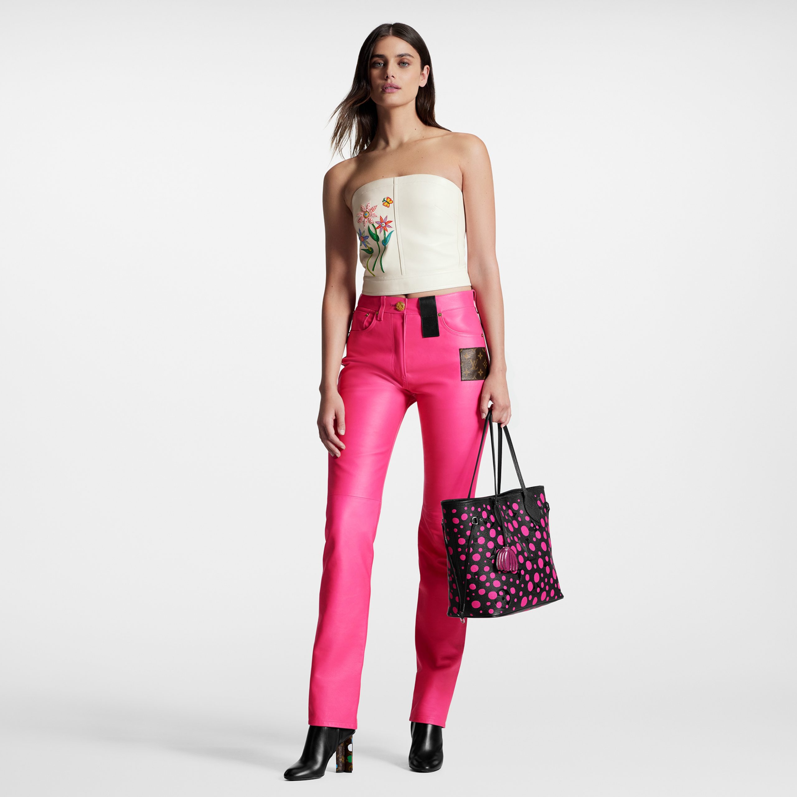 louis-vuitton-lv-x-yk-neverfull-mm-monogram-empreinte-leather-handbags-M46419_PM1_Cropped_20worn_20view-scaled-1.jpg