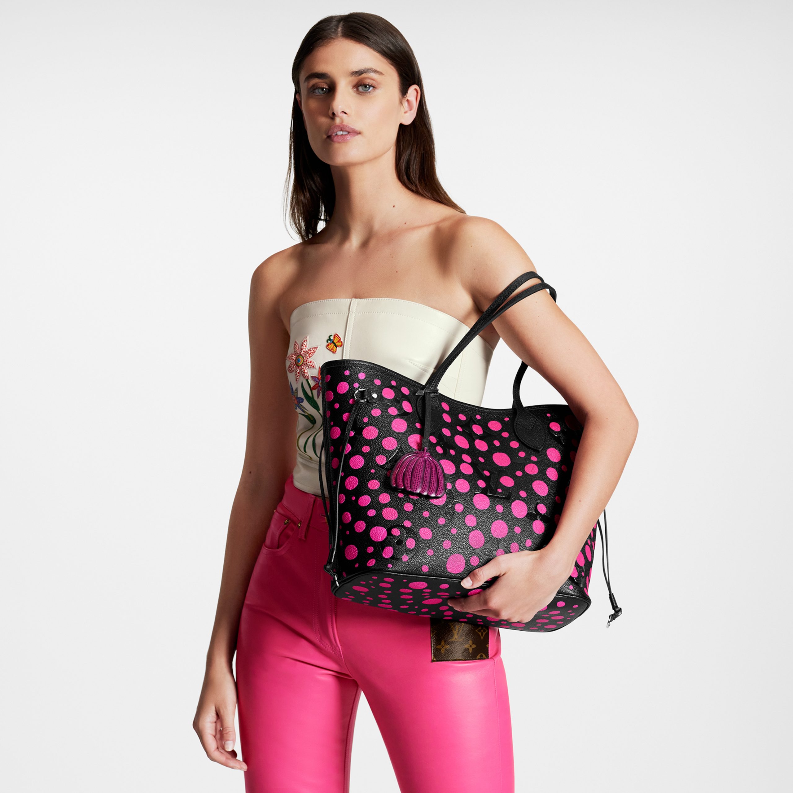 louis-vuitton-lv-x-yk-neverfull-mm-monogram-empreinte-leather-handbags-M46419_PM1_Worn_20view-scaled-1.jpg
