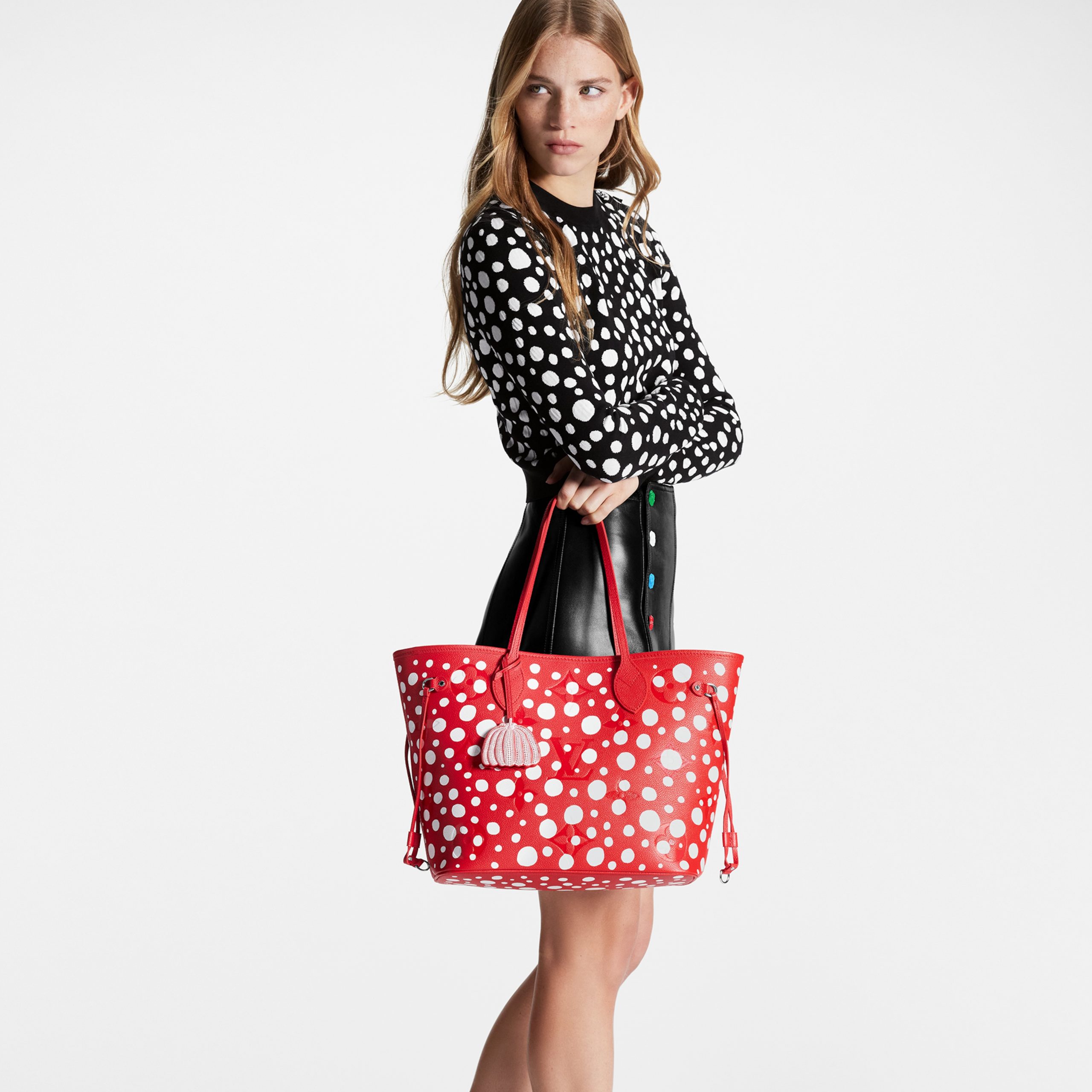 louis-vuitton-lv-x-yk-neverfull-mm-monogram-empreinte-leather-handbags-M46422_PM1_Cropped_20worn_20view-scaled-1.jpg