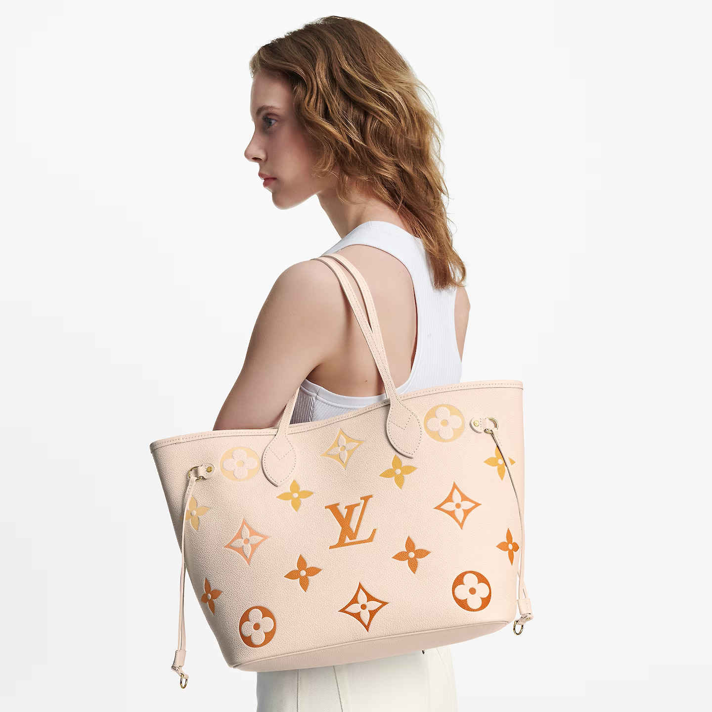 louis-vuitton-neverfull-mm-monogram-empreinte-leather-handbags-M46516_PM1_Cropped-worn-view.jpg