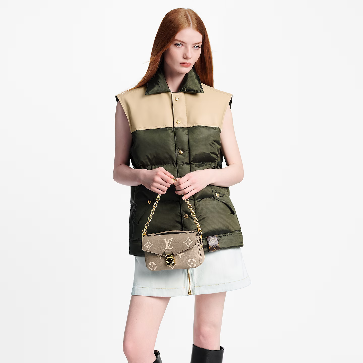 louis-vuitton-pochette-metis-east-west-monogram-empreinte-leather-handbags-M23081_PM1_Cropped-worn-view.jpg