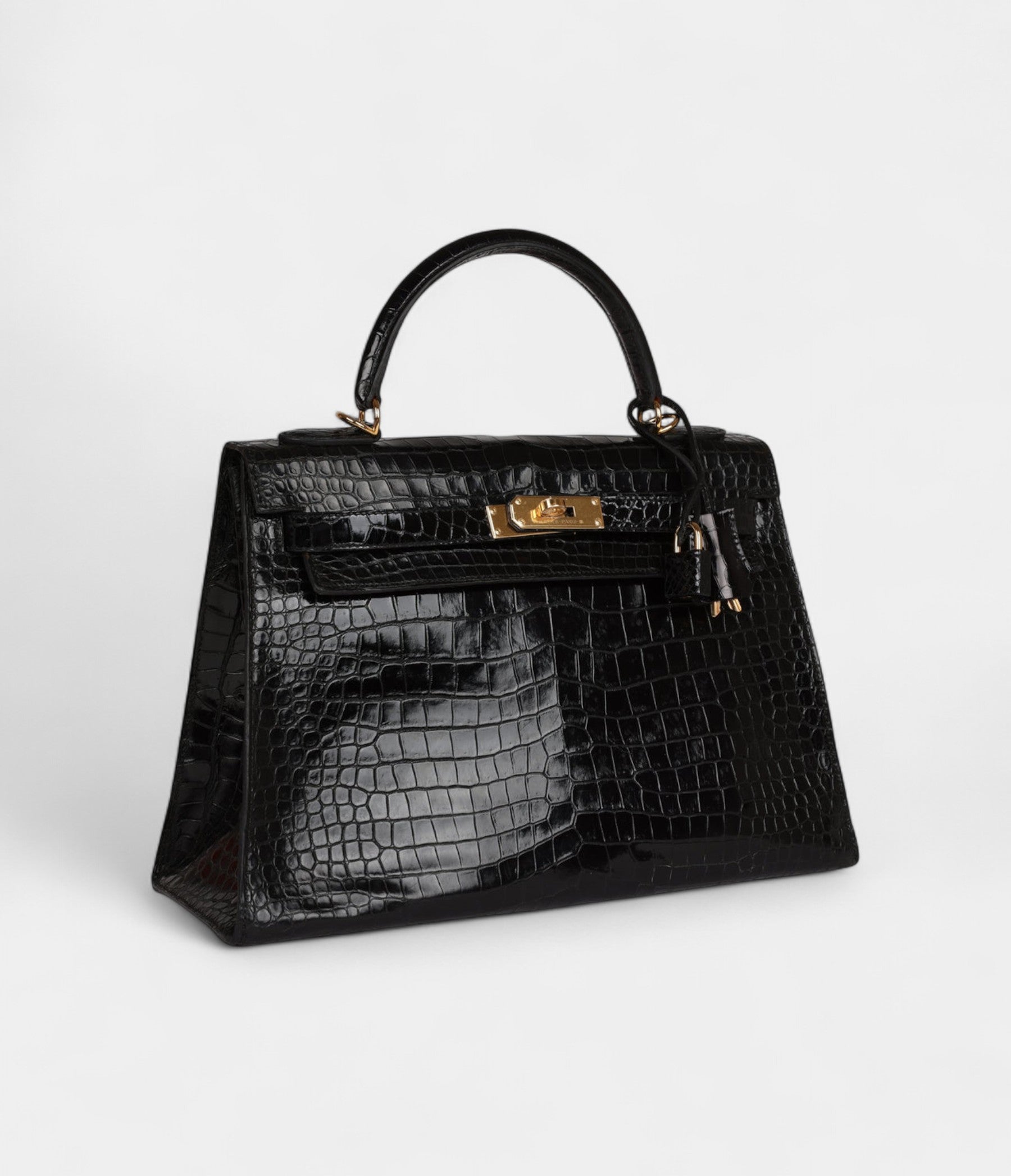 VintageHermesKelly32BlackShinyPorosusCrocodileGoldHardware_2.jpg Vintage Hermès Kelly 32 Black Shiny Porosus Crocodile Gold Hardware