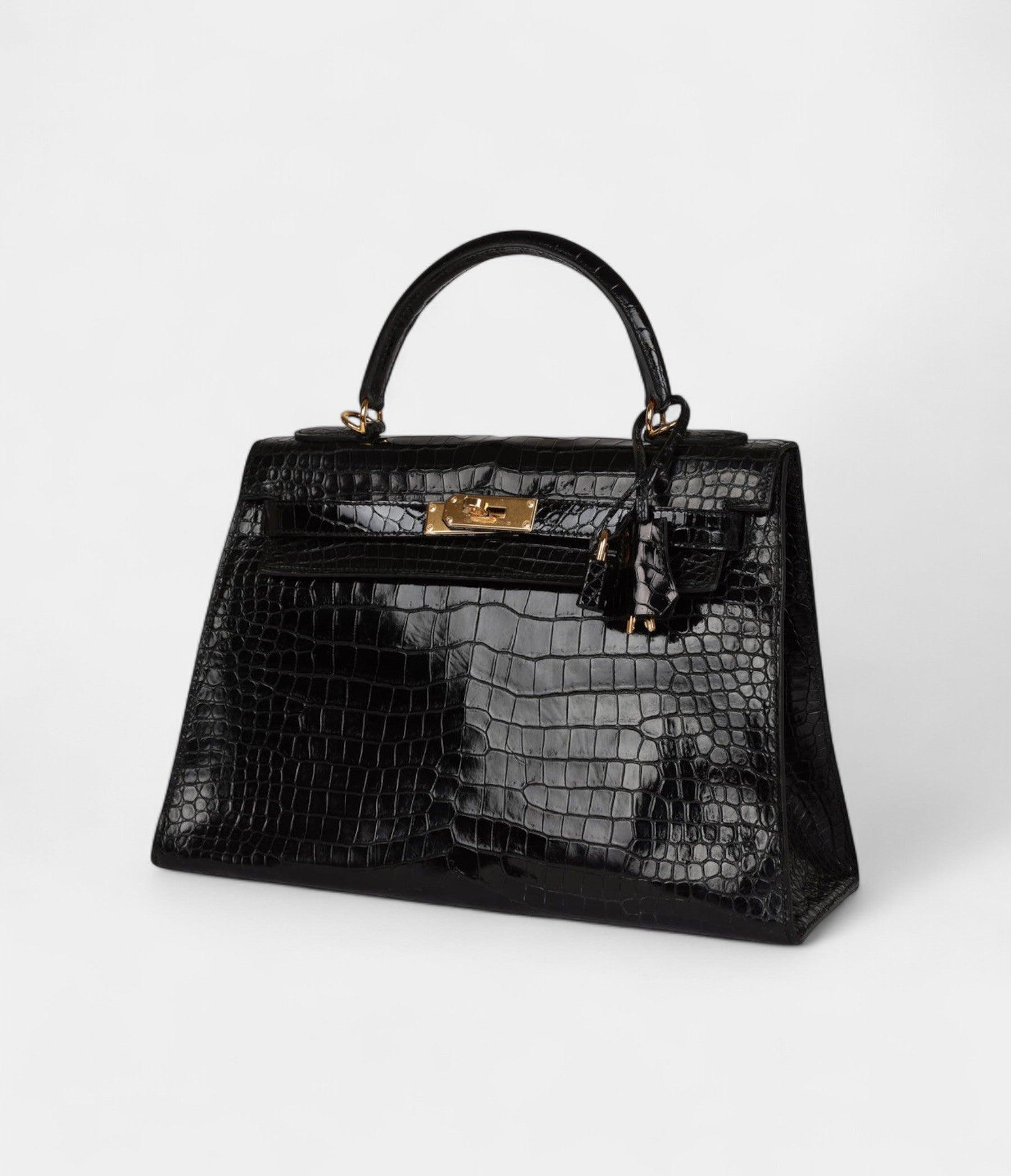 VintageHermesKelly32BlackShinyPorosusCrocodileGoldHardware_3.jpg Vintage Hermès Kelly 32 Black Shiny Porosus Crocodile Gold Hardware