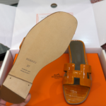 Hermès Oran Sandals for Women In Summer Quick Dry Leather with orange