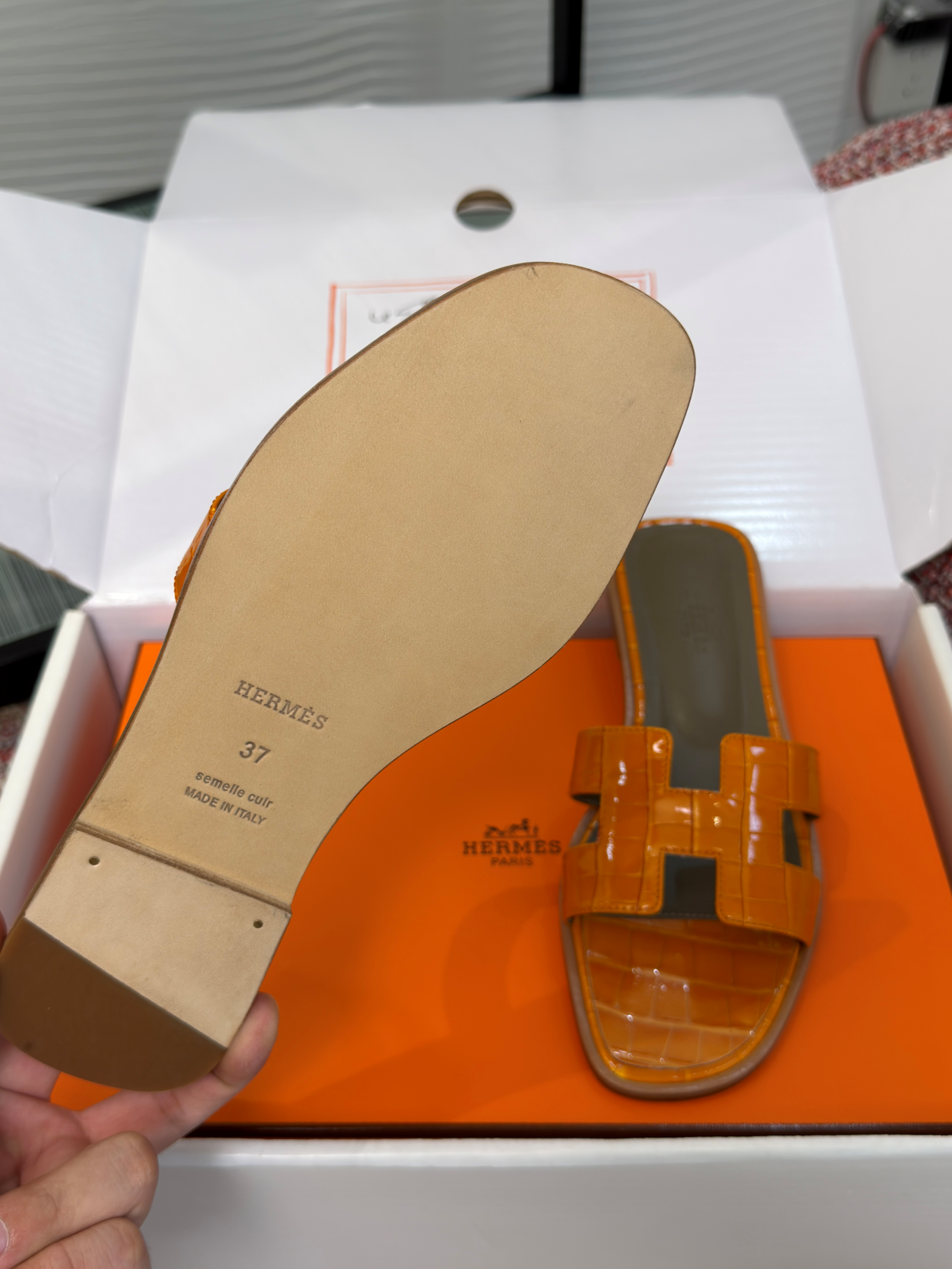 Hermès Oran Sandals for Women In Summer Quick Dry Leather with orange