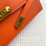 The New Hermès Kelly Shoulder Bag-orange color
