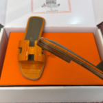 Hermès Oran Sandals for Women In Summer Quick Dry Leather with orange