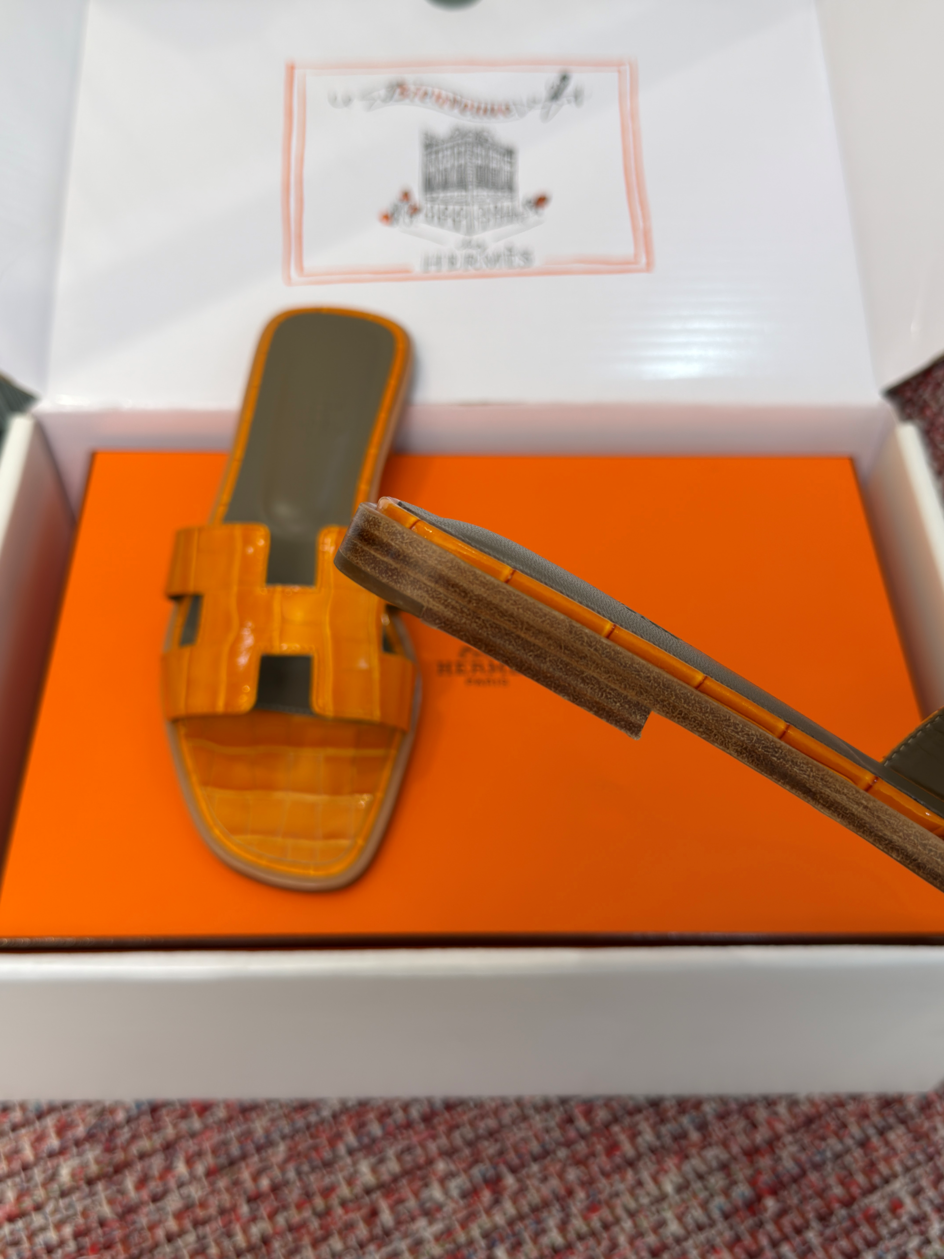 Hermès Oran Sandals for Women In Summer Quick Dry Leather with orange