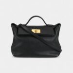 Hermès 24/24 Handmade in Black and Gold-Tone Leather with Palladium Hardware