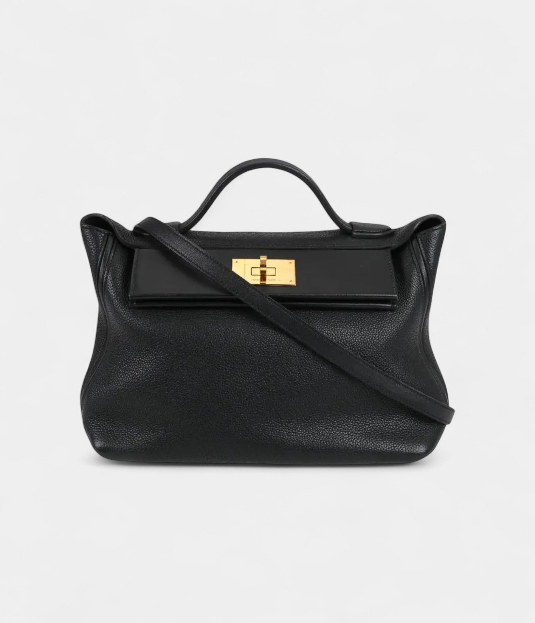 Hermès 24/24 Handmade in Black and Gold-Tone Leather with Palladium Hardware