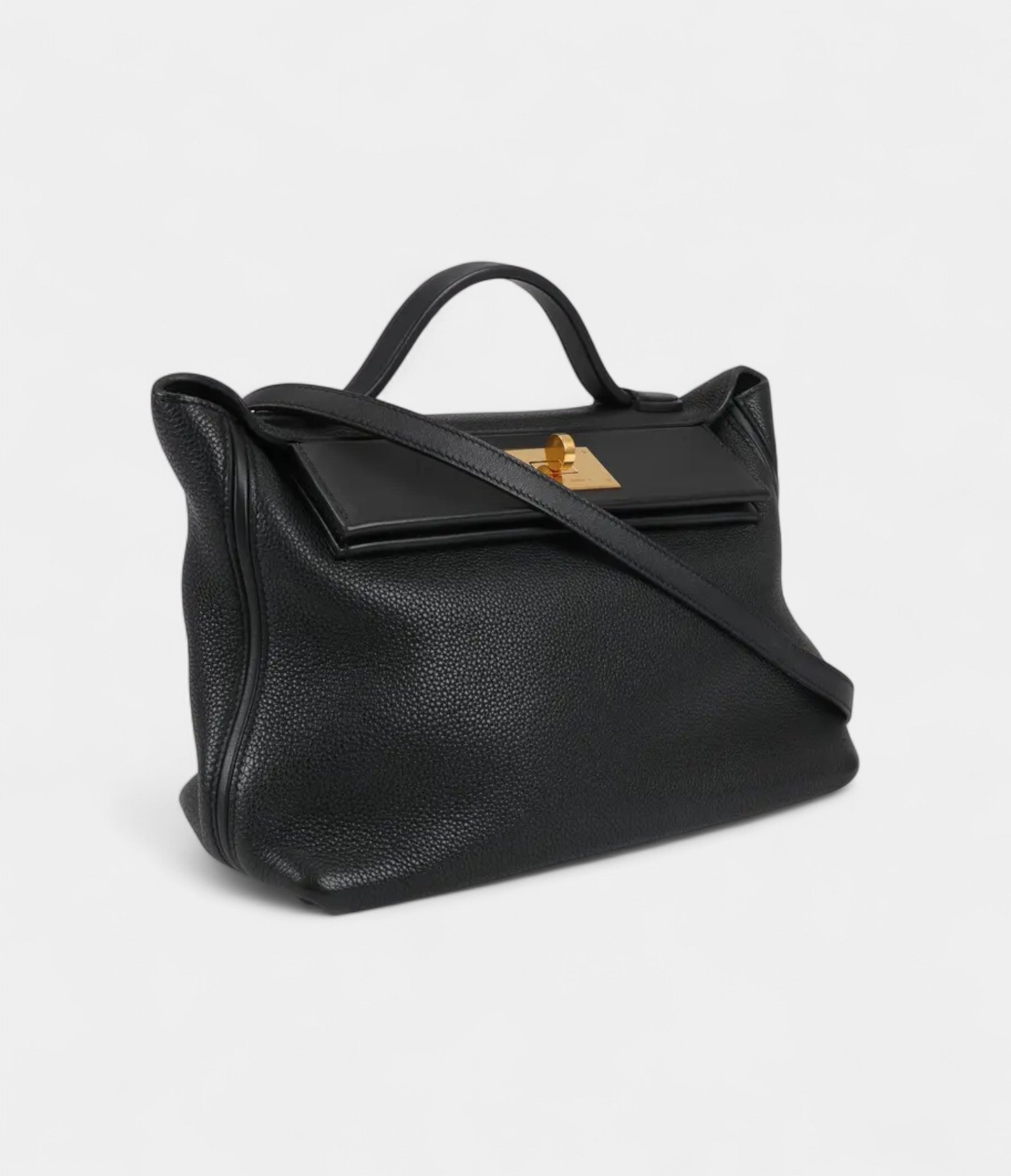 Hermès 24/24 Handmade in Black and Gold-Tone Leather with Palladium Hardware