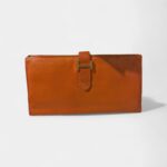 Hermès Béarn Leather Wallet In Orange Blend Of Elegance And Functionality