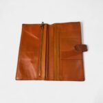 Hermès Béarn Leather Wallet In Orange Blend Of Elegance And Functionality