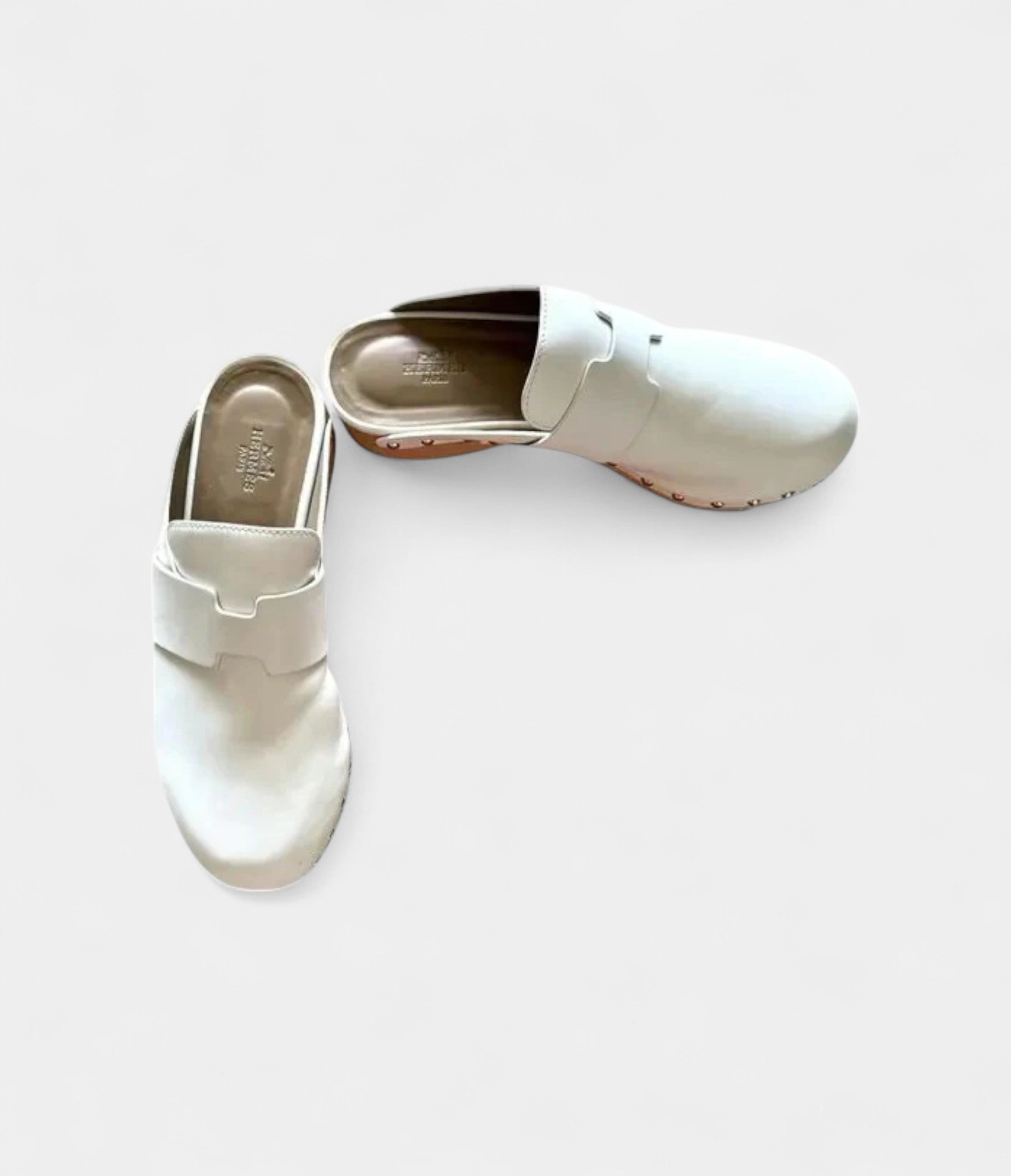 Hermès Calya Leather Mules & Clogs A Fusion of Comfort and Elegance