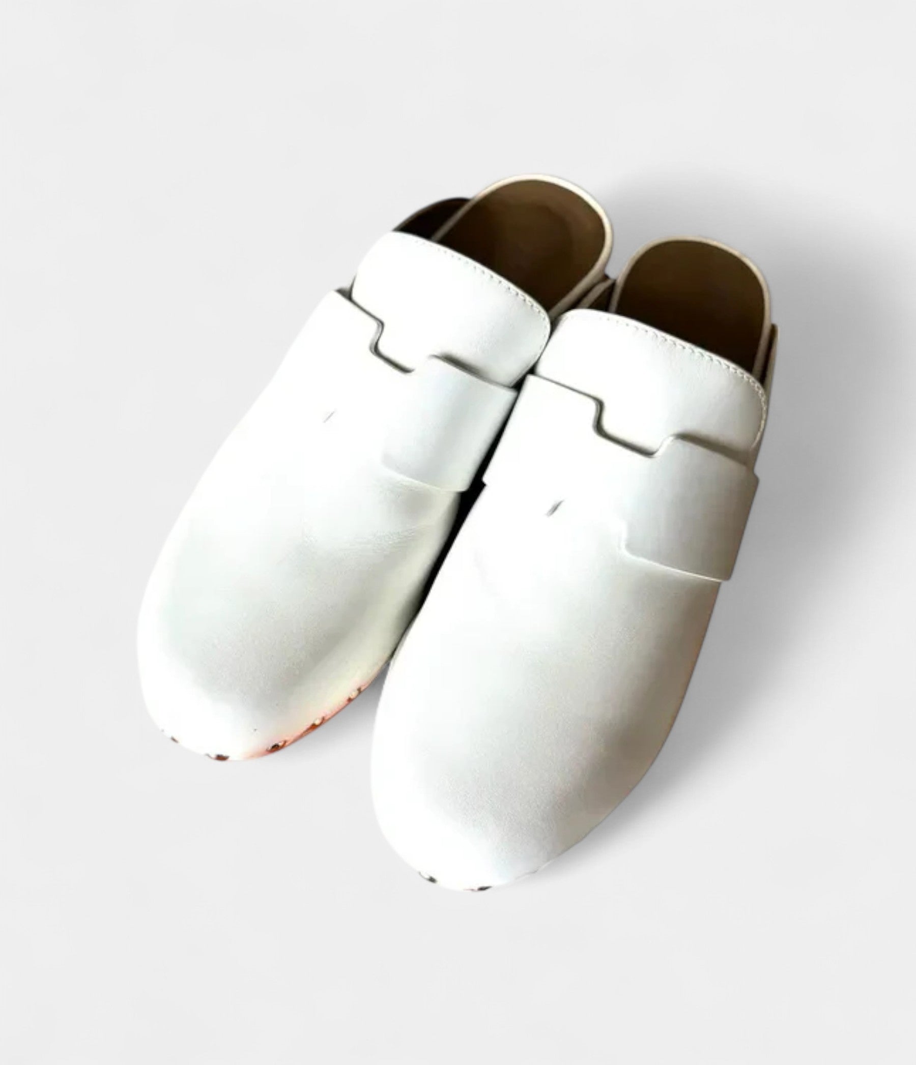 HermesCalyaLeatherMules_ClogsAFusionofComfortandElegance_2_dcee185f-eb31-44e0-afb9-859d3517235e.jpg Hermès Calya Leather Mules & Clogs A Fusion of Comfort and Elegance
