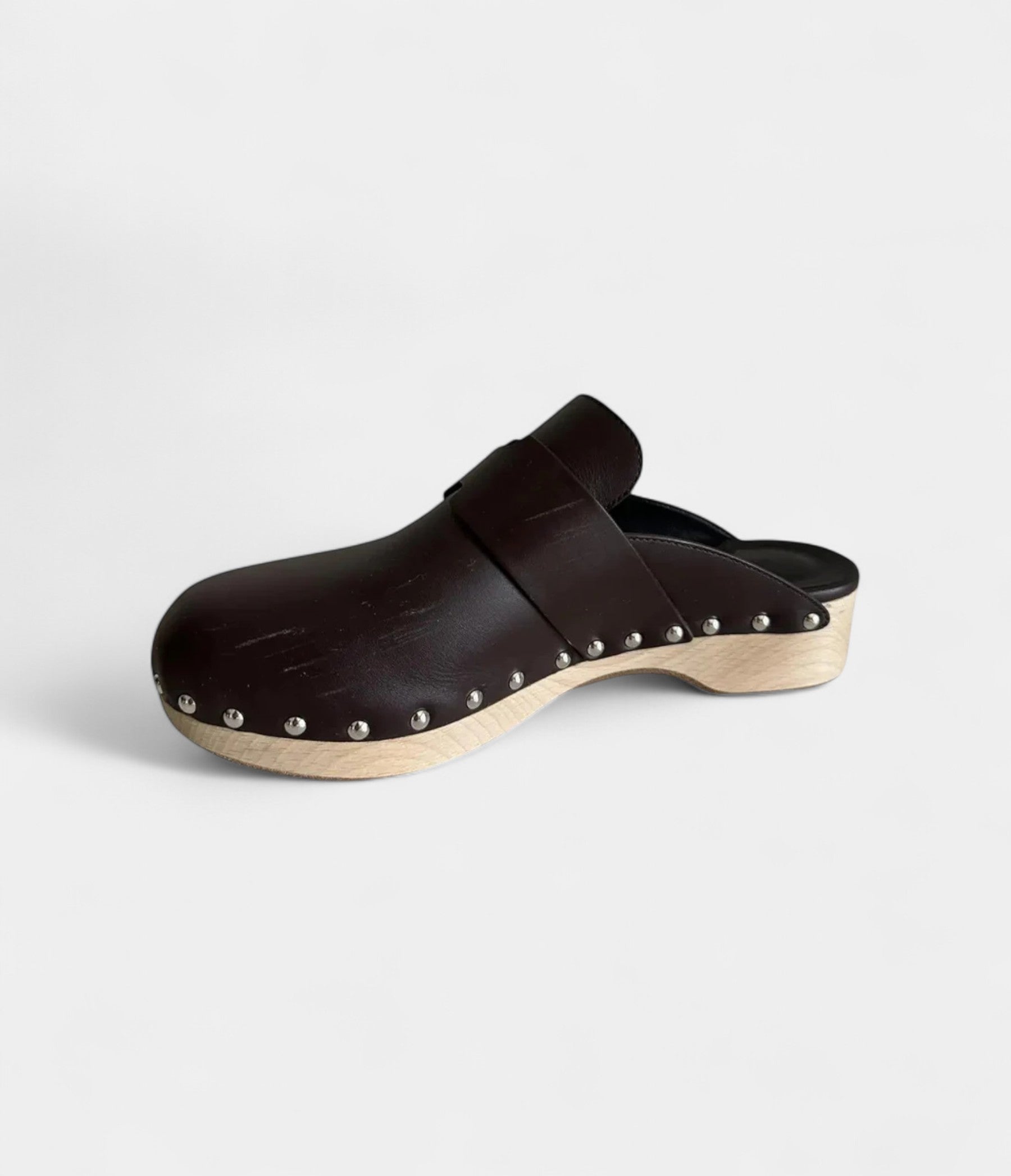 Hermès Calya Leather Mules & Clogs Timeless Craftsmanship with Effortless Elegance