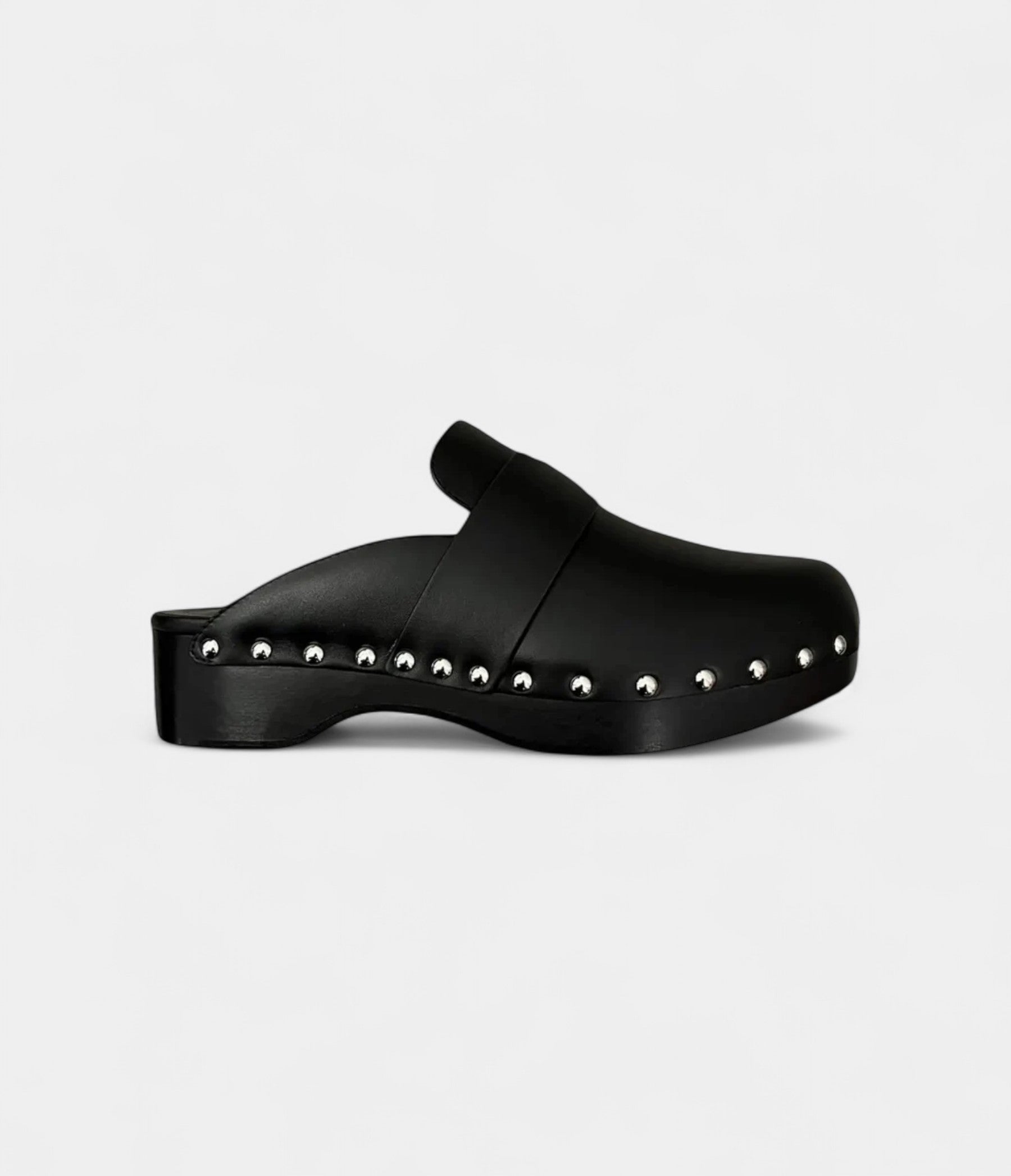 Hermès Calya Leather Mules & Clogs Timeless Elegance in Every Step