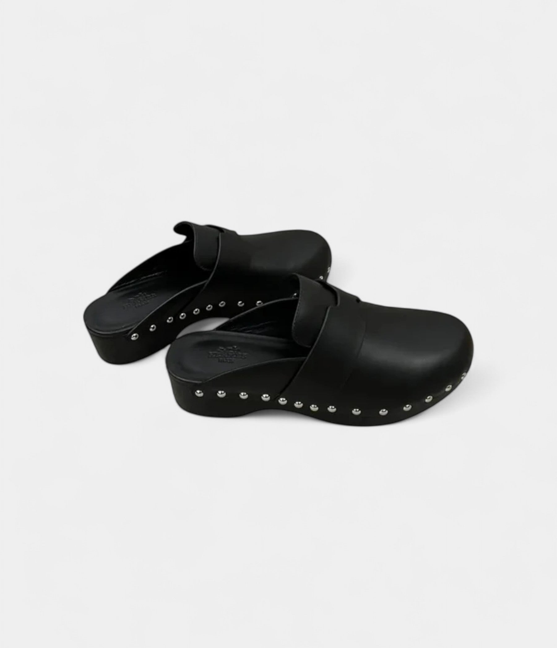 Hermès Calya Leather Mules & Clogs Timeless Elegance in Every Step