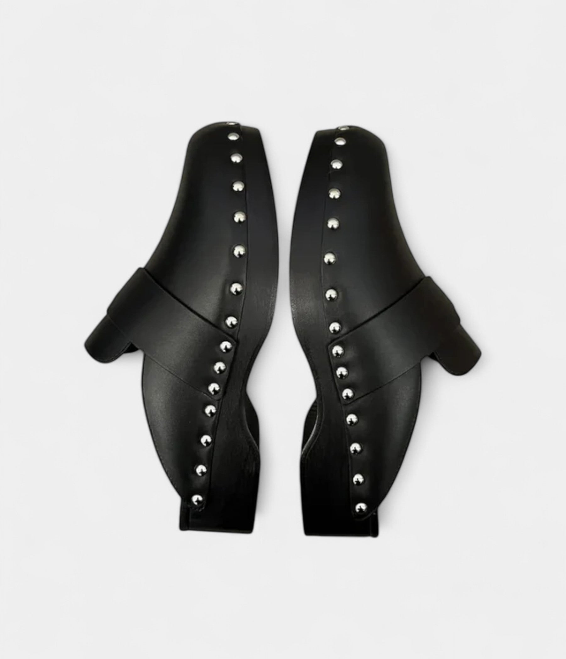 Hermès Calya Leather Mules & Clogs Timeless Elegance in Every Step