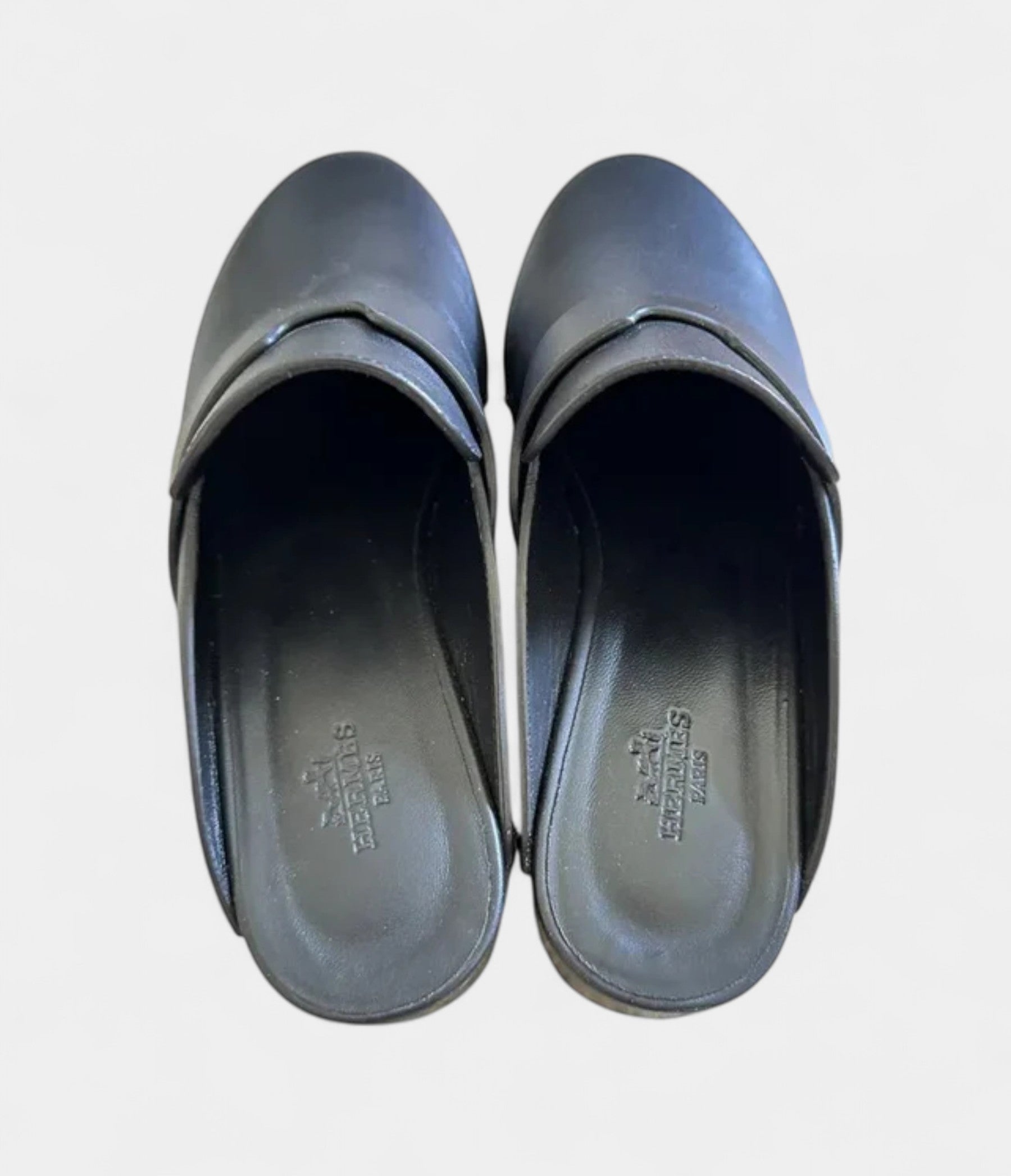 Hermès Calya Leather Mules & Clogs Where Sculptural Design Meets Effortless Luxury