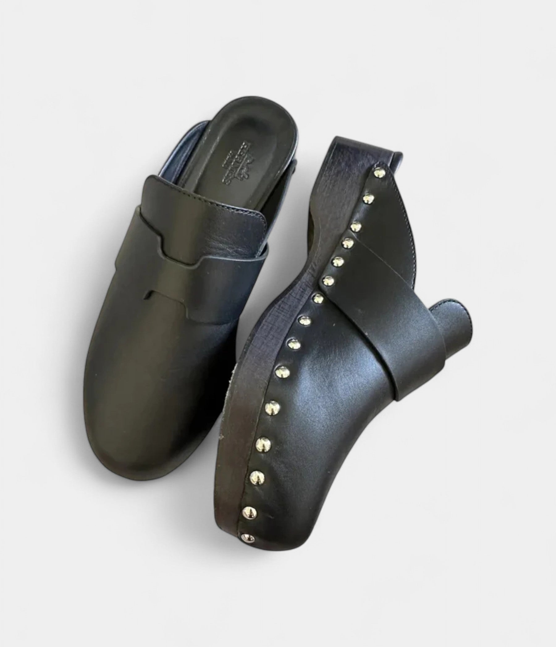 Hermès Calya Leather Mules & Clogs Where Sculptural Design Meets Effortless Luxury