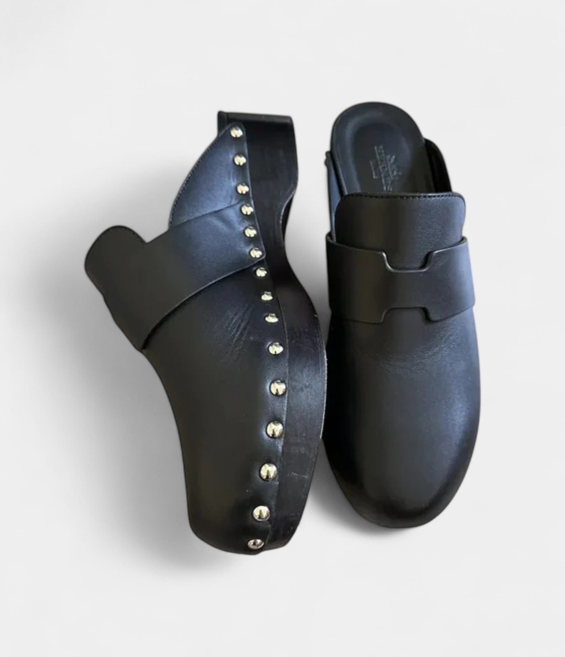 Hermès Calya Leather Mules & Clogs Where Sculptural Design Meets Effortless Luxury