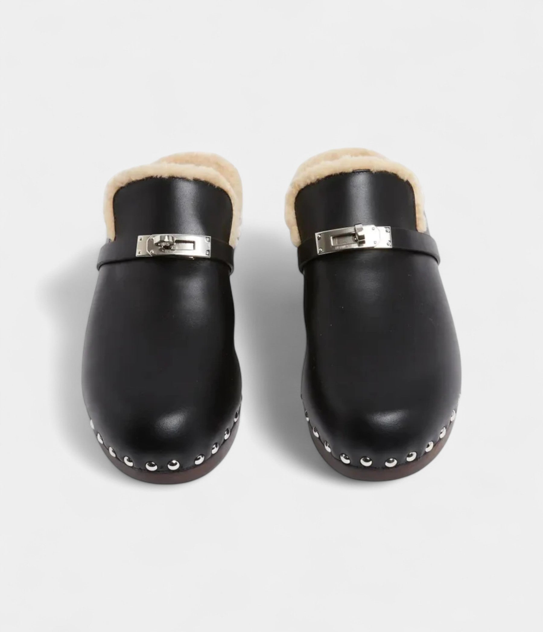 Hermès Carlotta Leather Mules & Clogs A Statement of Effortless Elegance