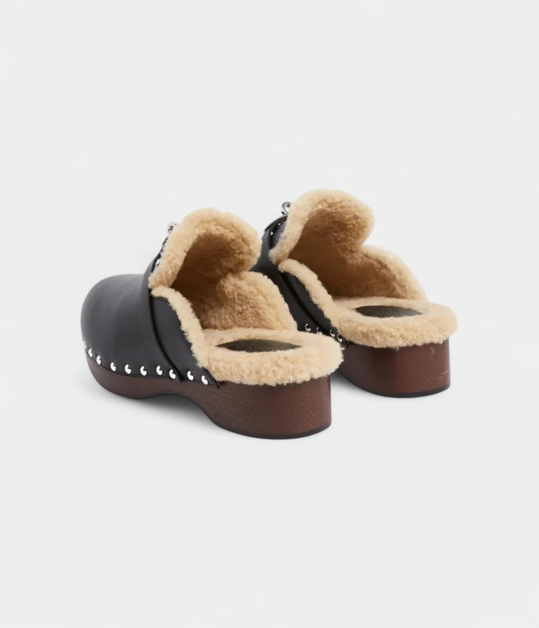Hermès Carlotta Leather Mules & Clogs A Statement of Effortless Elegance