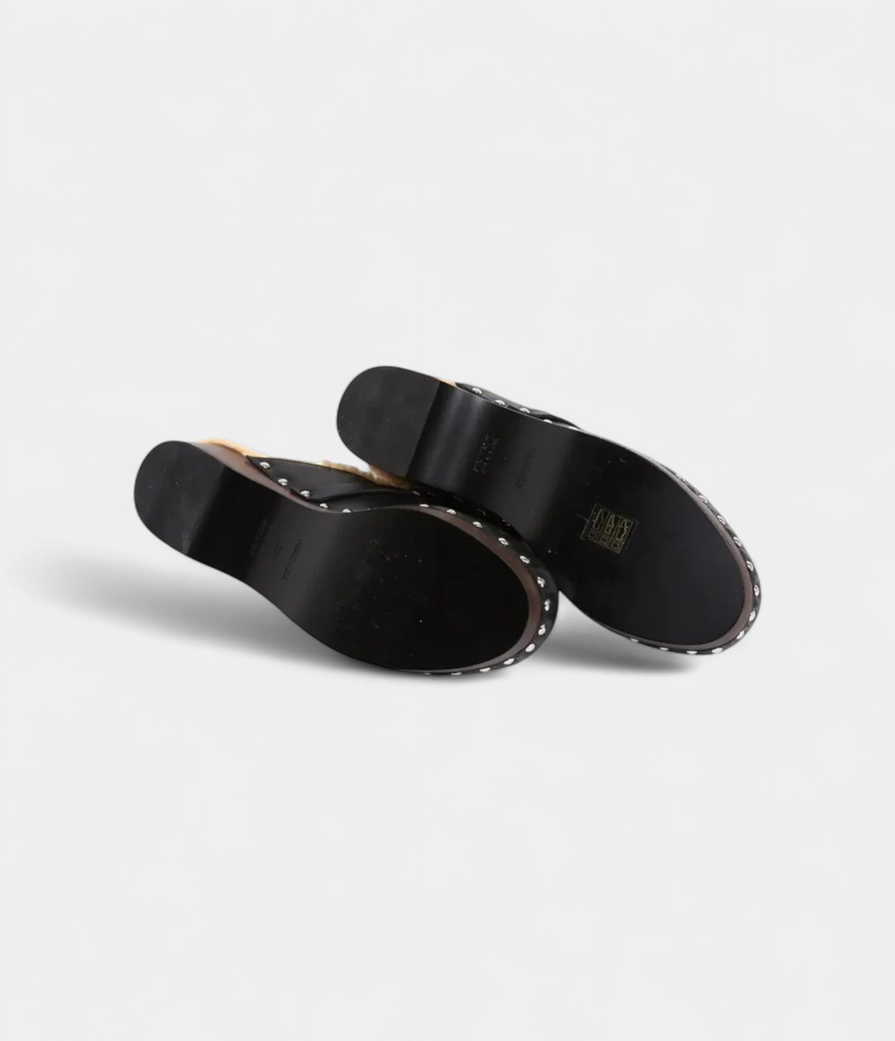 Hermès Carlotta Leather Mules & Clogs A Statement of Effortless Elegance