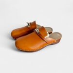 Hermès Carlotta Leather Mules & Clogs Timeless Comfort with Sophisticated Flair