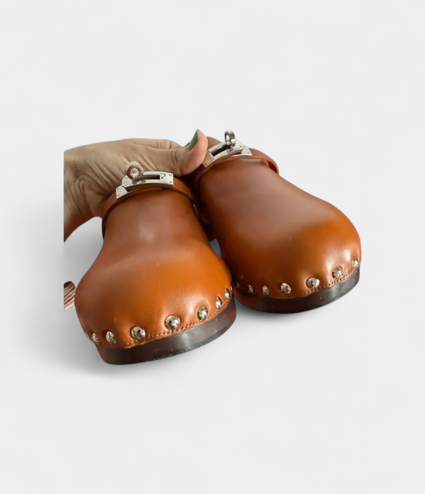 HermesCarlottaLeatherMules_ClogsTimelessComfortwithSophisticatedFlair_5_cf242af2-69db-4f9a-9003-89e8d1e73407.jpg Hermès Carlotta Leather Mules & Clogs Timeless Comfort with Sophisticated Flair