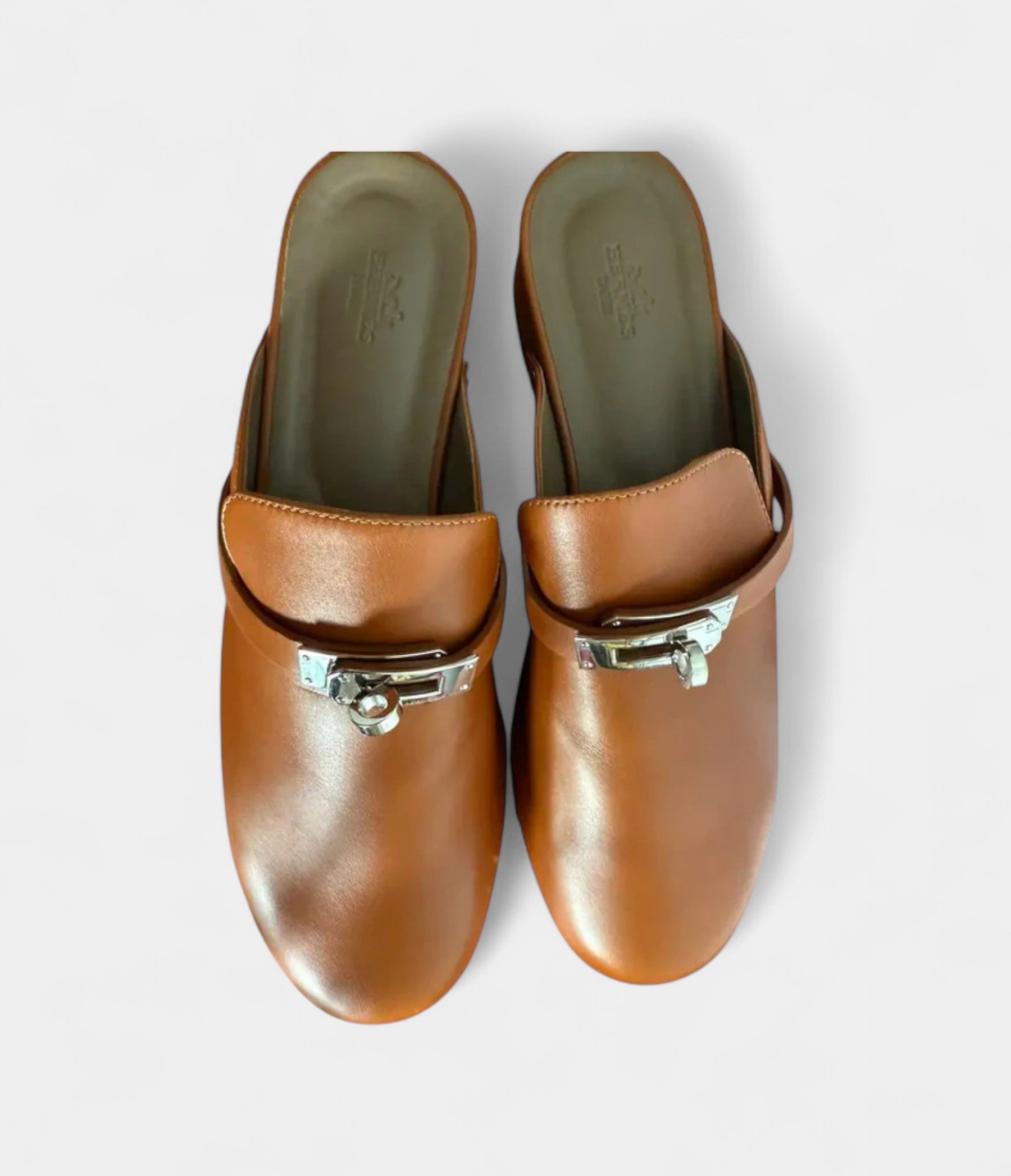 HermesCarlottaLeatherMules_ClogsTimelessComfortwithSophisticatedFlair_7_3707901d-130e-4231-8248-c6853f00e29c.jpg Hermès Carlotta Leather Mules & Clogs Timeless Comfort with Sophisticated Flair