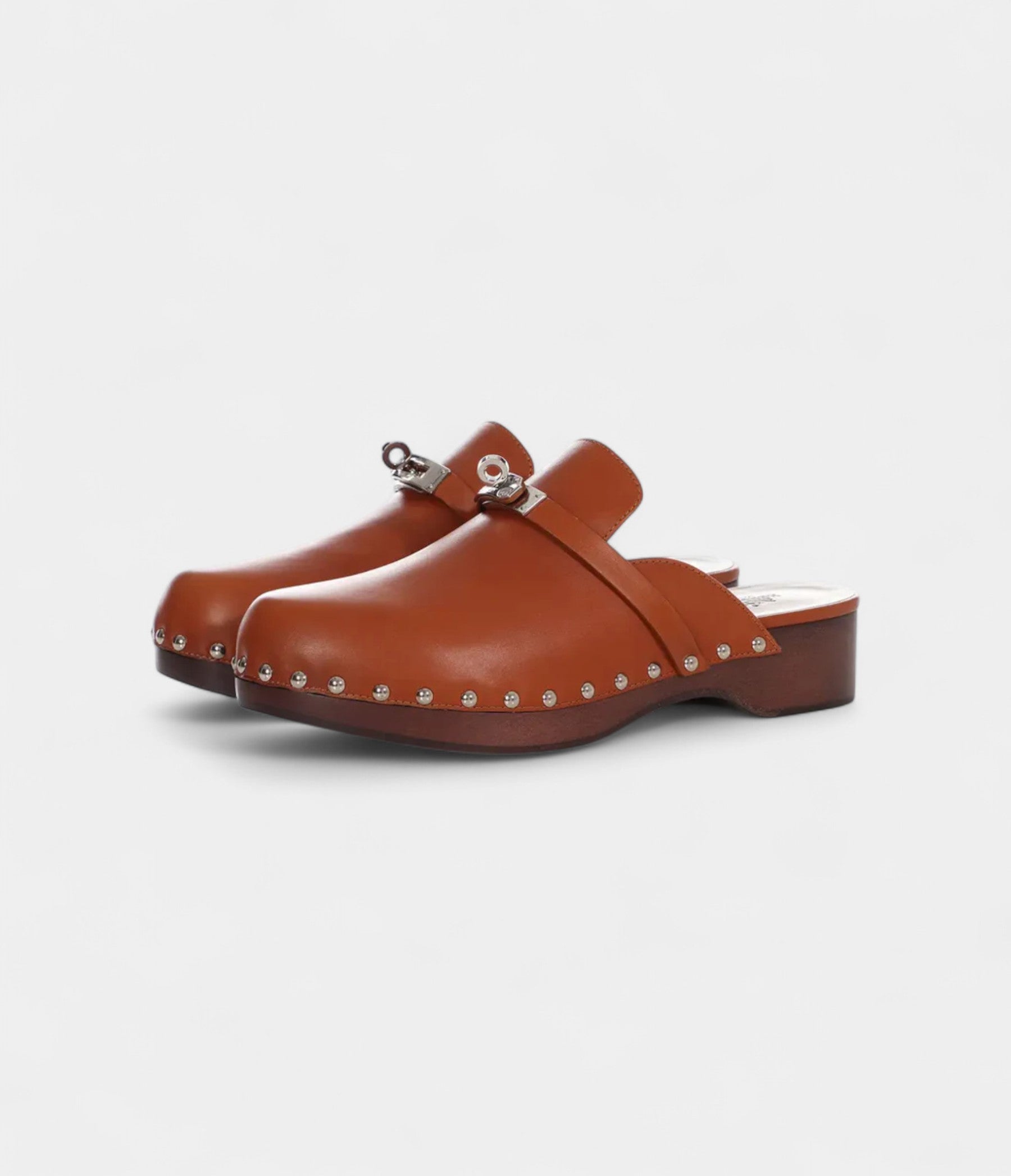 Hermès Carlotta Leather Mules & Clogs – Effortless Elegance