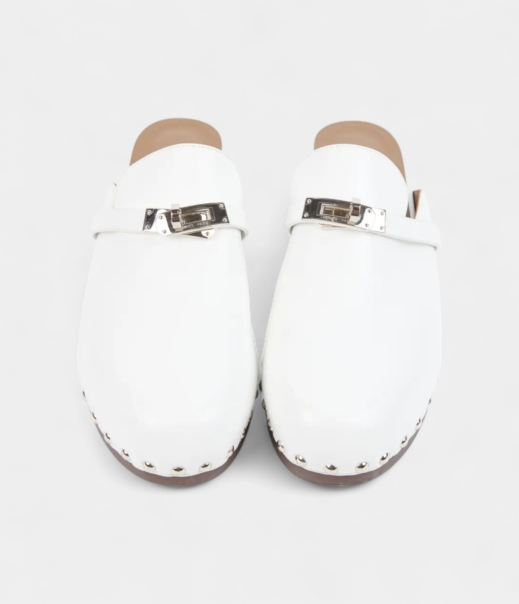 Hermès Carlotta White Leather Mules with Studded Wooden Platform and Palladium Hardware