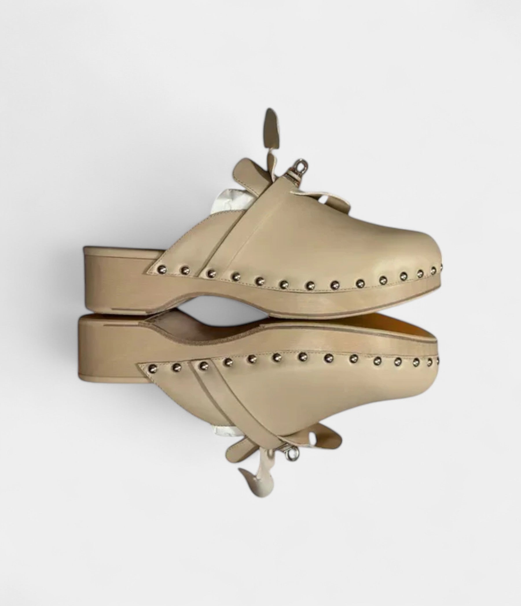 Hermès Leather Mules & Clogs Where Timeless Craft Meets Modern Comfort