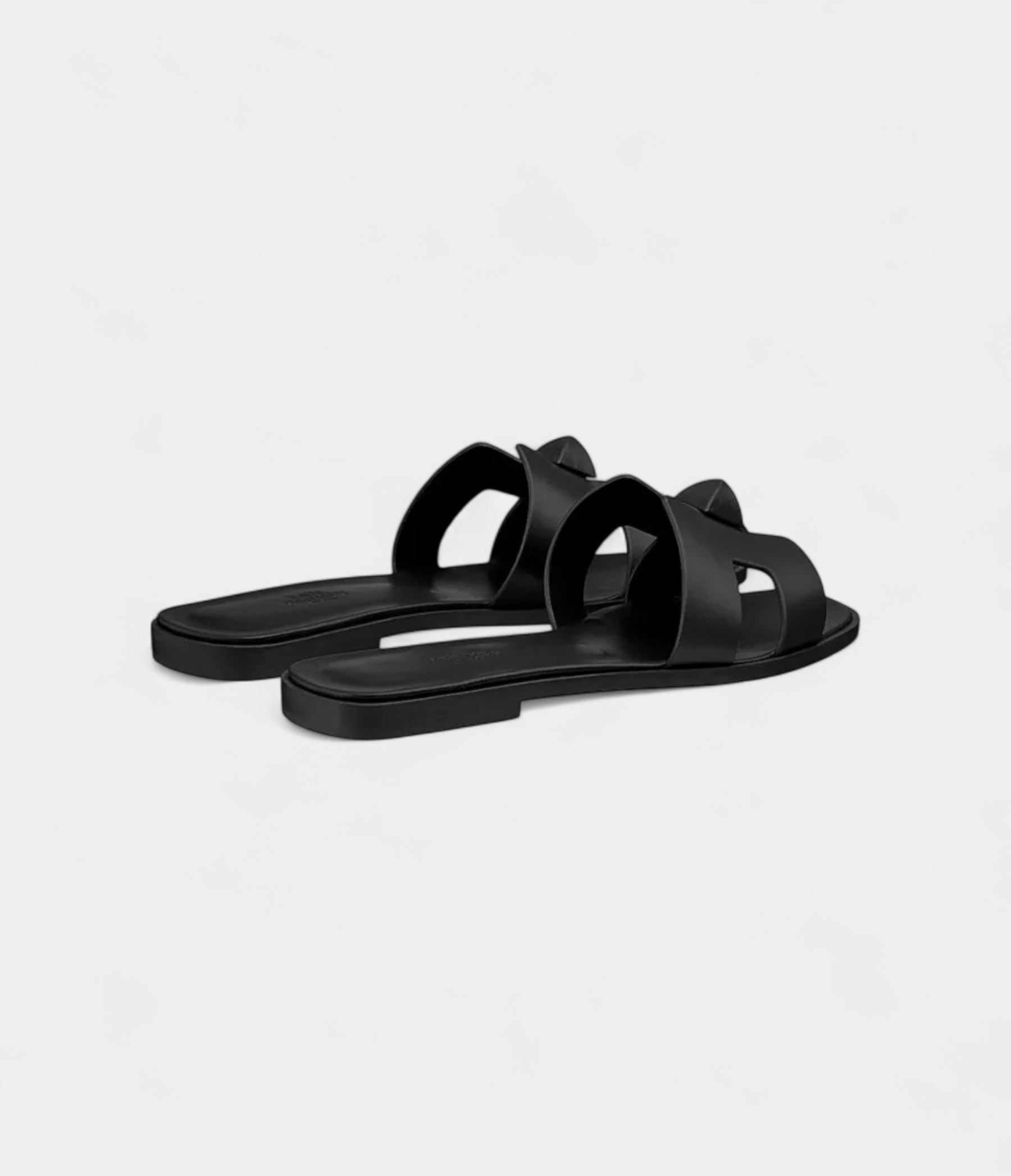 Hermès Oran Sandals for Women In Black Top Grain Cow Leather