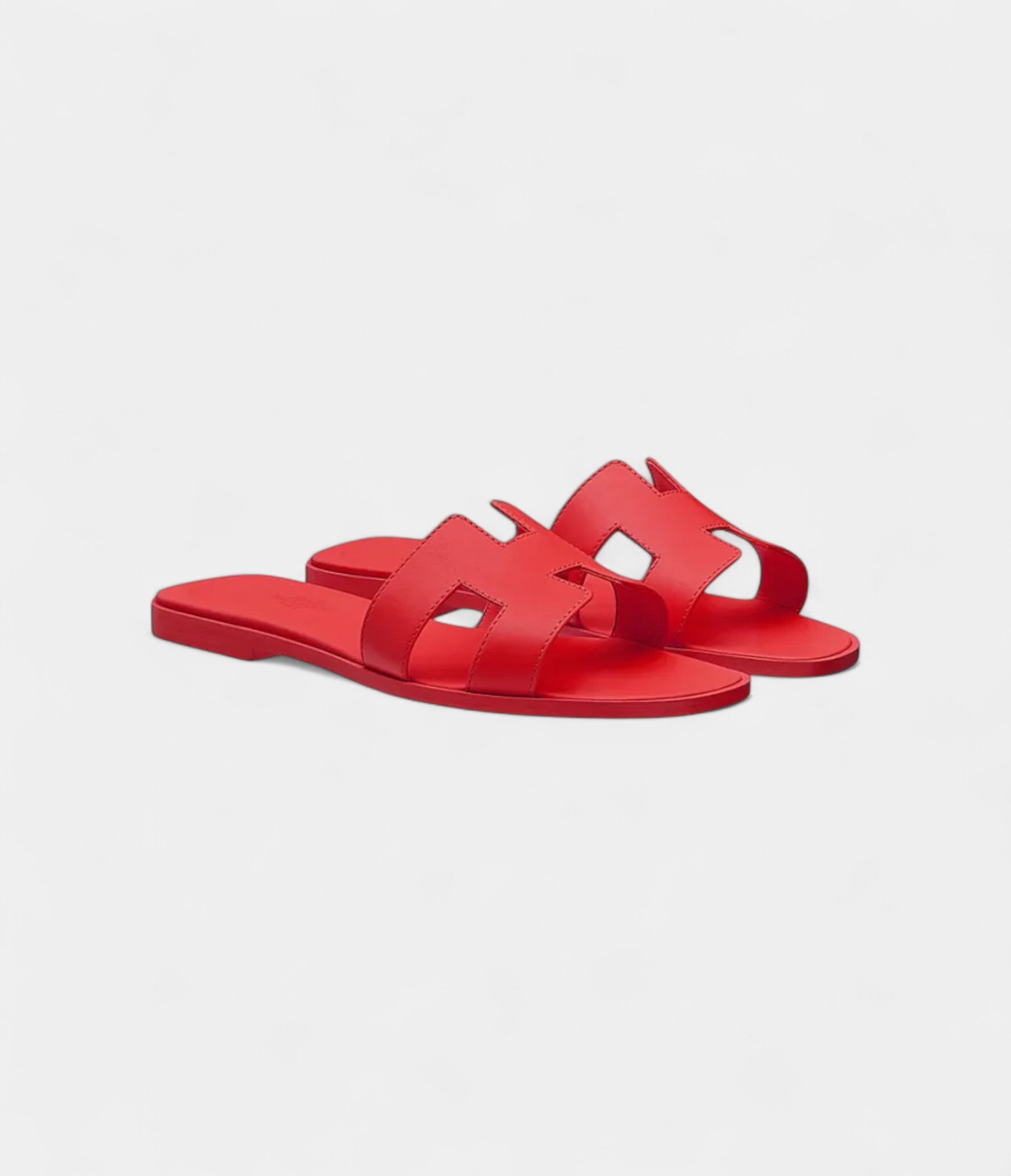 Hermès Oran Sandals for Women In Heart Red in Top Grain Cow Leather