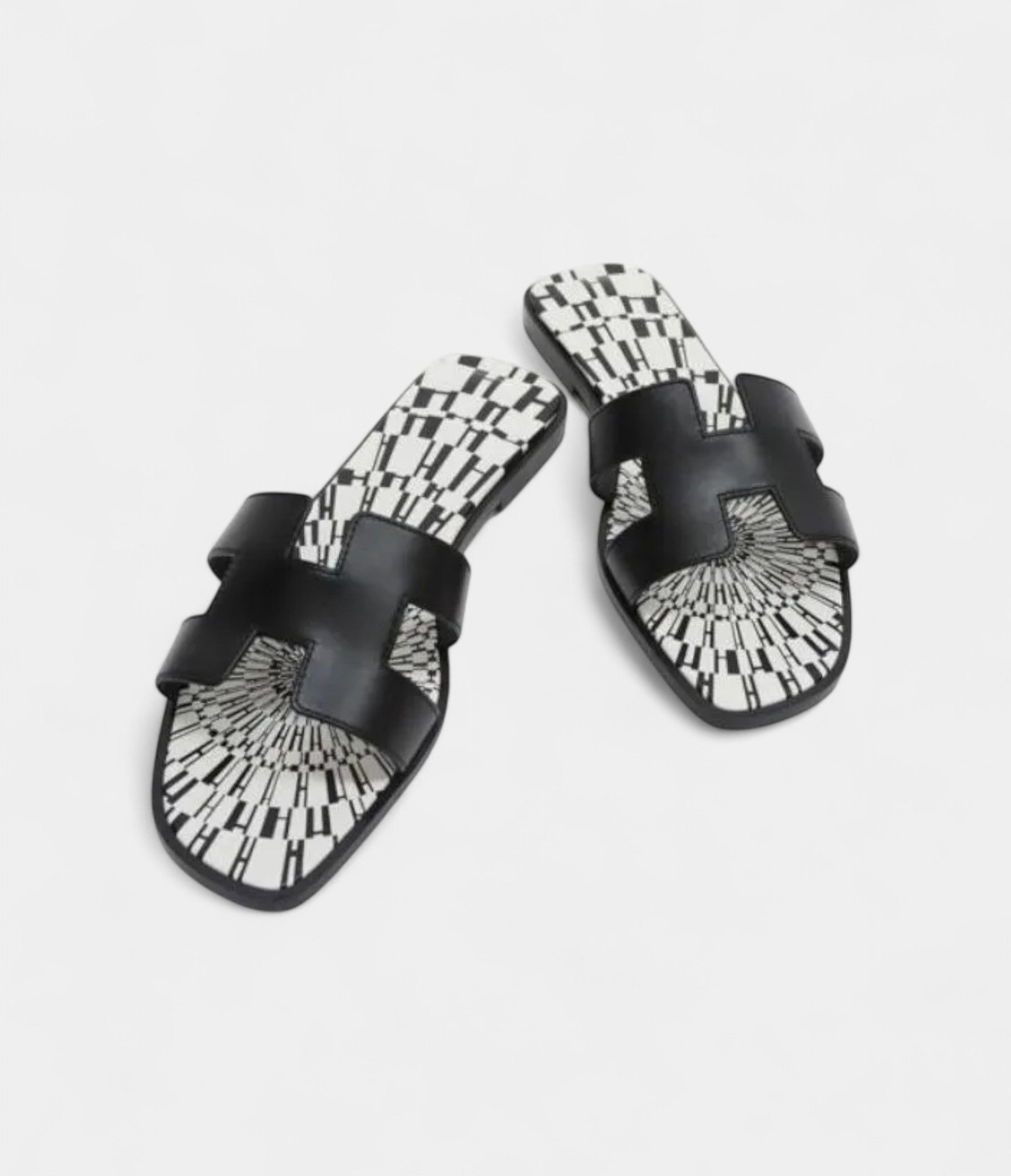Hermès Oran Stylish Sandals for Women in Black & White Calfskin