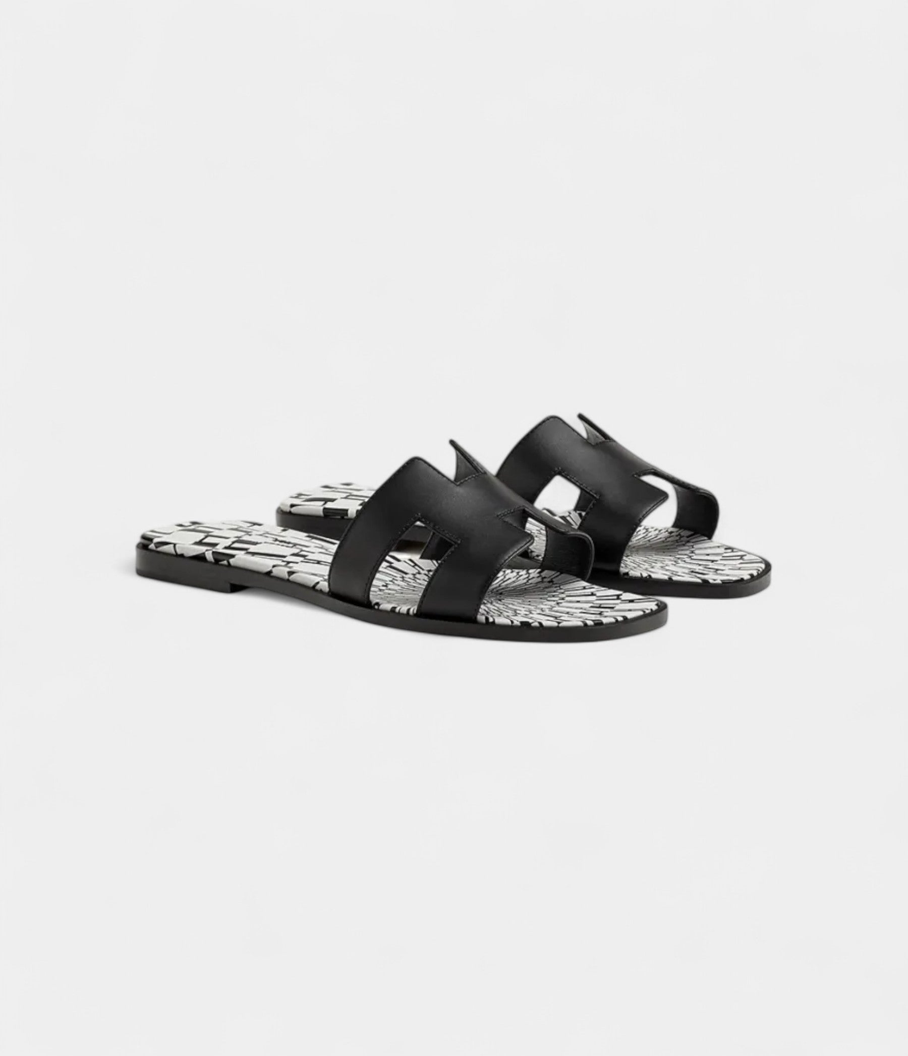 Hermès Oran Stylish Sandals for Women in Black & White Calfskin