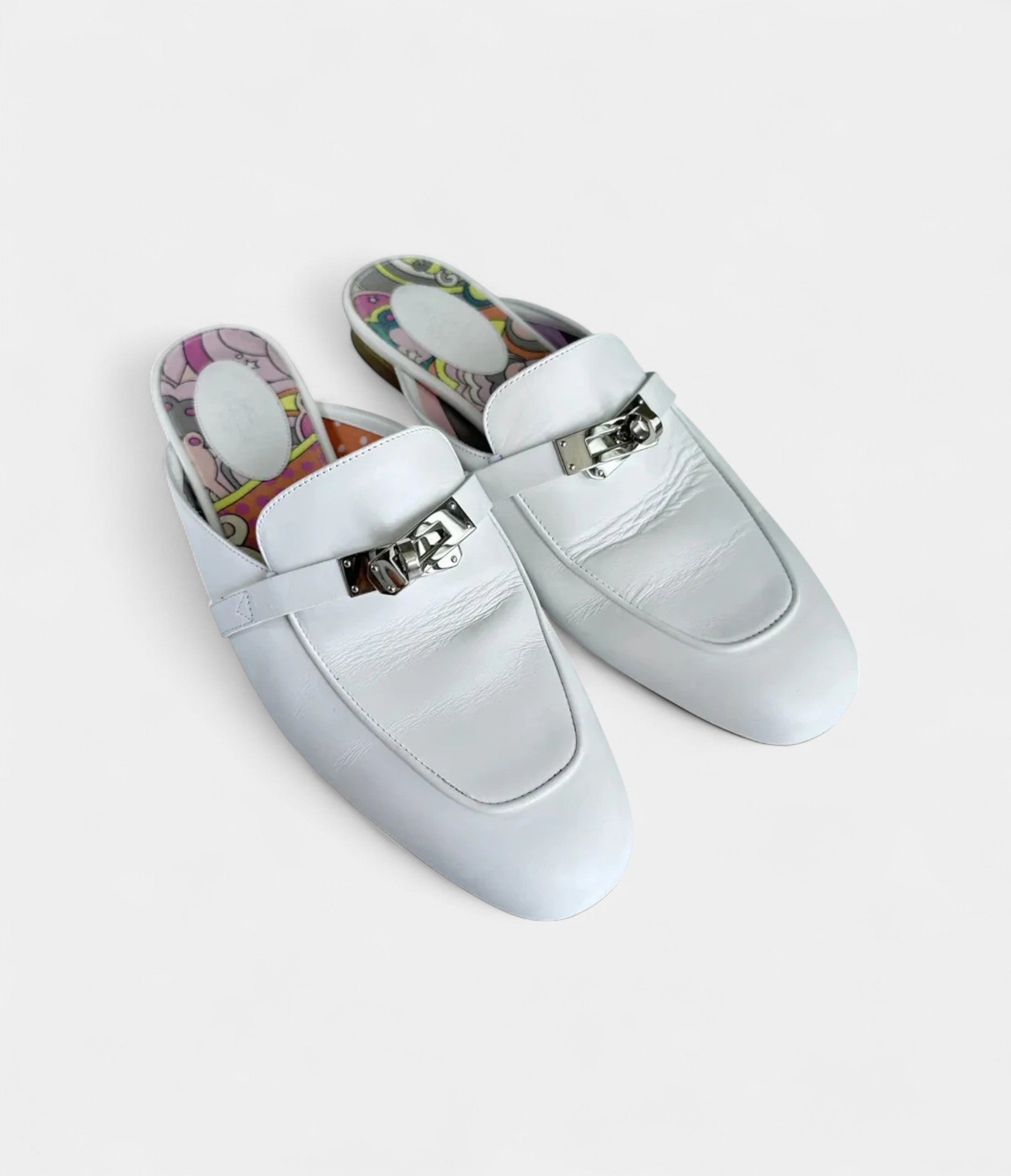 Hermès Oz Leather Mules & Clogs Iconic Elegance with a Contemporary Edge